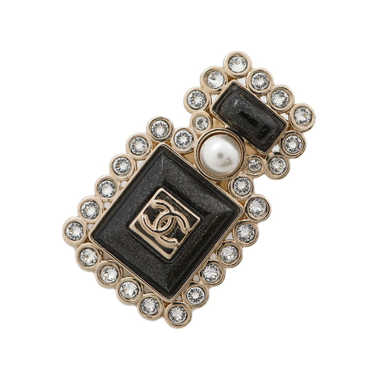 Silver Tone Metal Brooch with Coco Mark Motif by Chanel: Silver Tone Metal Brooch with Coco Mark Motif by Chanel This Chanel Coco Mark accessory is crafted from silver-toned metal and is designed for women. Made in France, it features the signature Chanel m