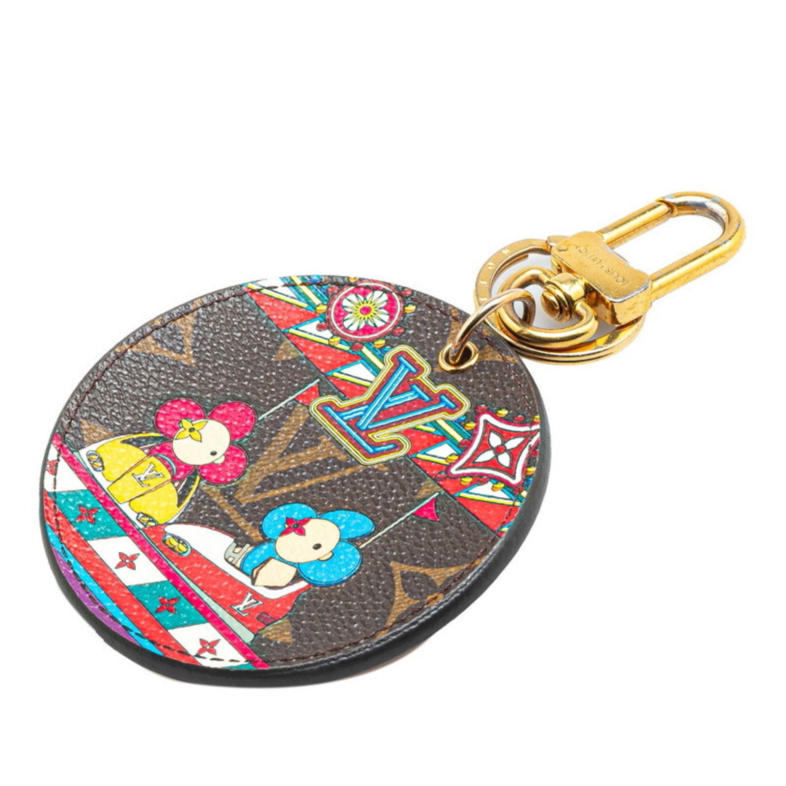 Brown Canvas Louis Vuitton Porte Cles Bag Charm Key Holder: Brown Canvas Louis Vuitton Porte Cles Bag Charm Key Holder This Louis Vuitton Porte cles is a women's key charm crafted from brown canvas. Made in France, it features a charm size of 7.92 cm x 7.92 cm