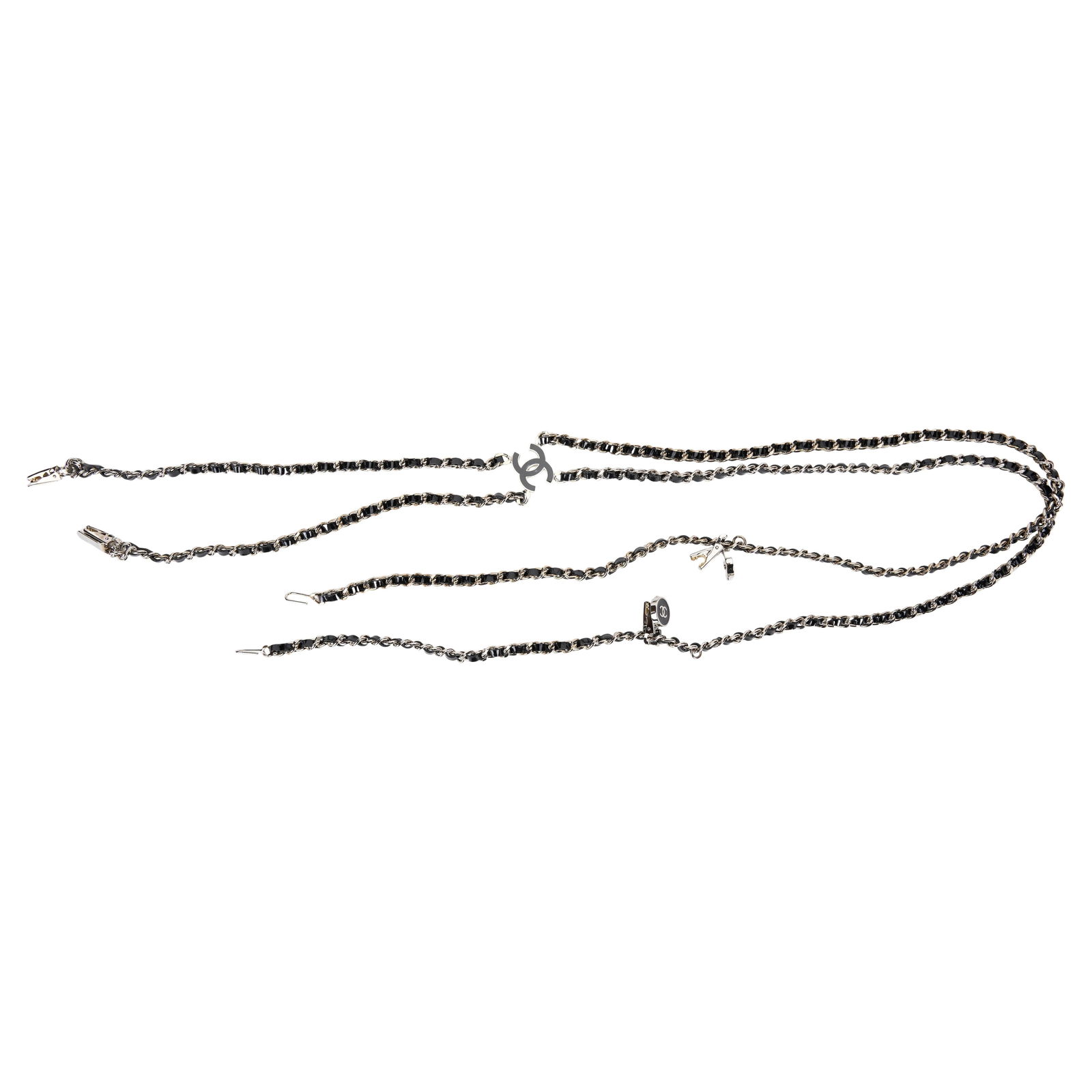 Chanel Rare Silver Black Adjustable Suspenders with CC Logo: Chanel Rare Silver Black Adjustable Suspenders with CC Logo Discover the elegance of these rare Chanel suspenders, crafted from high-quality materials. Featuring a striking silver tone complemented by