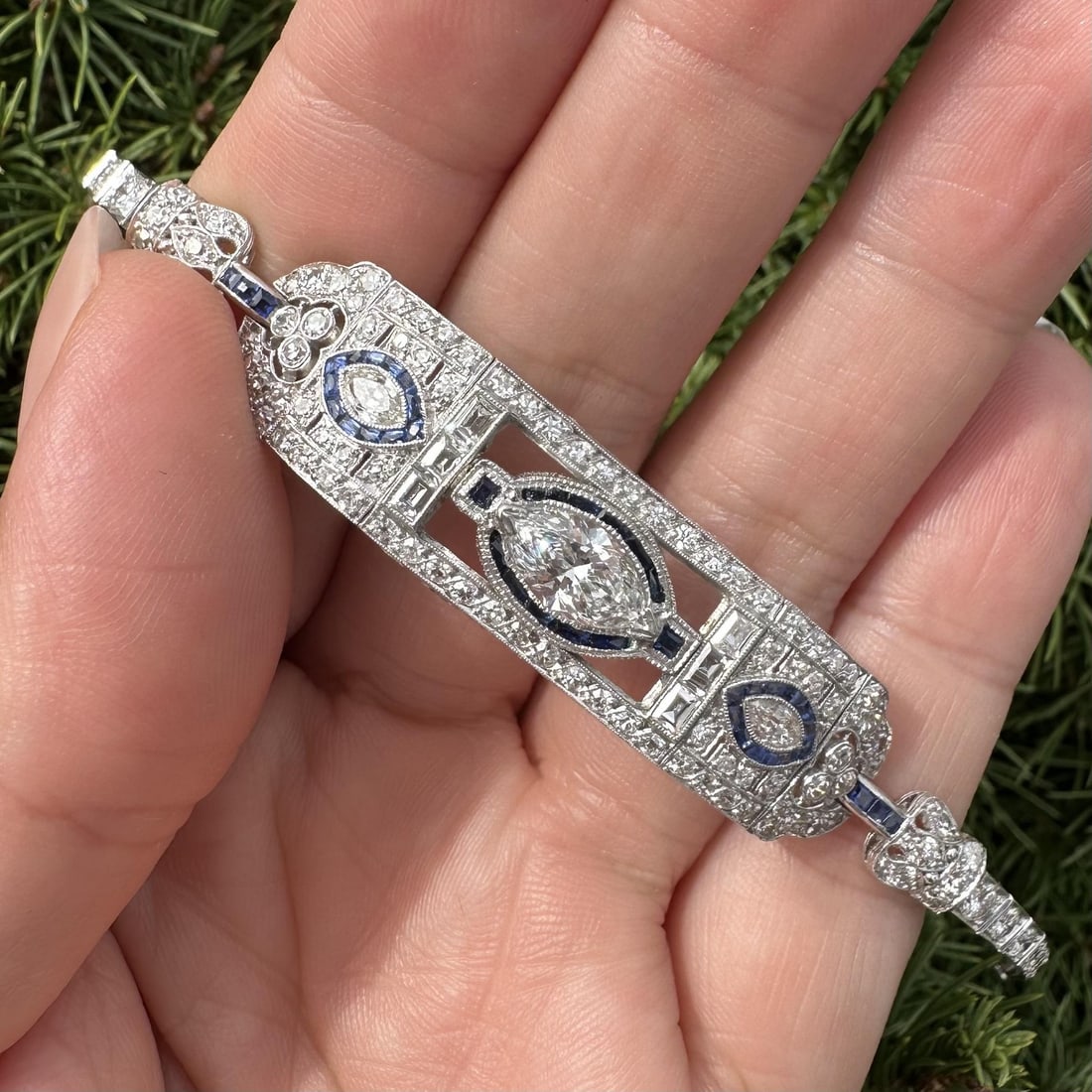 Art Deco Platinum GIA Certified 1.17ct Marquise Diamond Sapphire Bracelet: Art Deco Platinum GIA Certified 1.17ct Marquise Diamond Sapphire Bracelet Discover an exquisite Antique Art Deco bracelet meticulously crafted in solid platinum, featuring a stunning GIA-certified mar