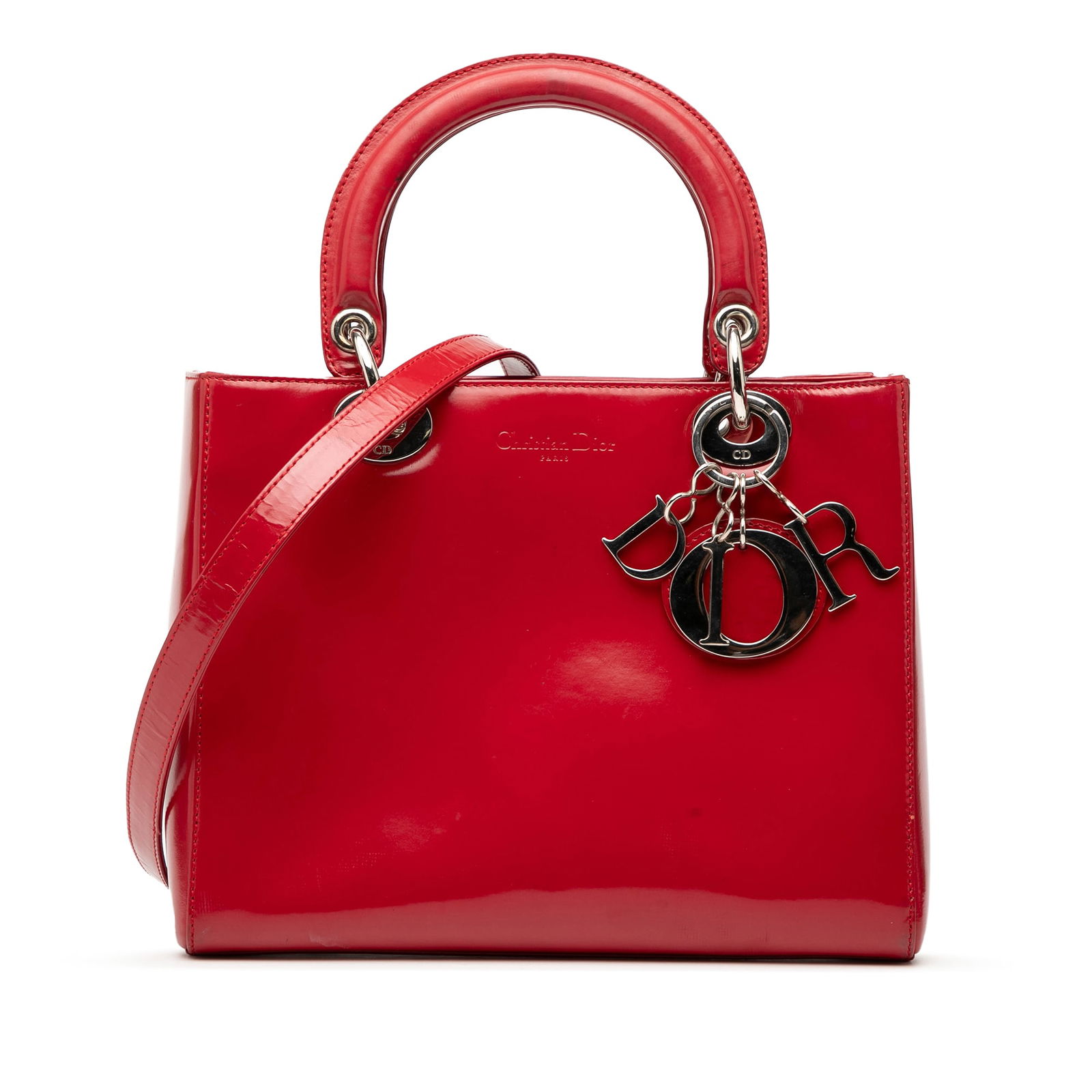 Dior Medium Patent Lady Dior Bag Red Leather Italy: Dior Medium Patent Lady Dior Bag Red Leather Italy The Medium Patent Lady Dior satchel is a stunning accessory crafted from luxurious patent leather in a vibrant red hue. This elegant bag features fla