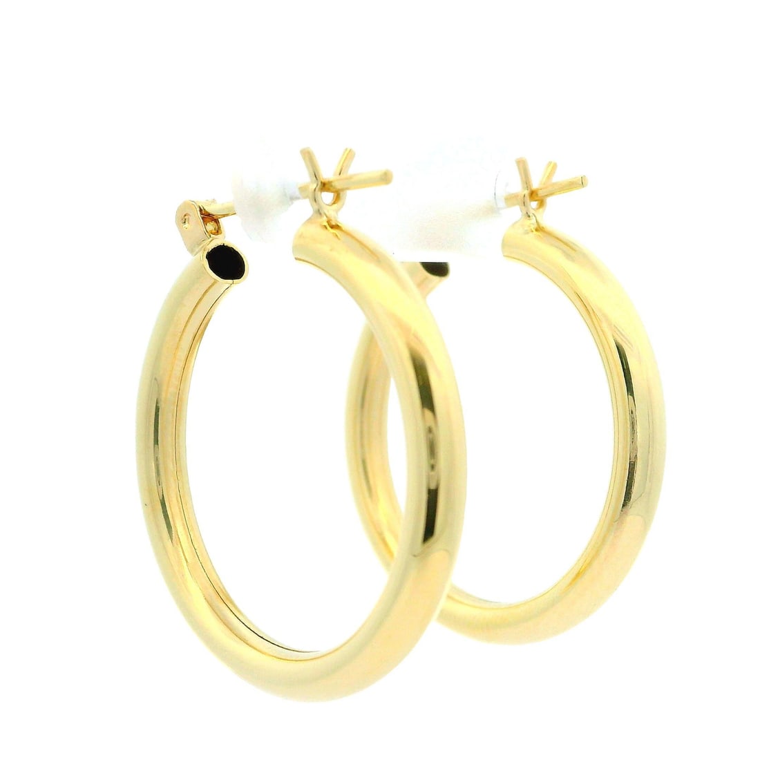 Classic 14k Yellow Gold Polished Tube Hoop Earrings: Classic 14k Yellow Gold Polished Tube Hoop Earrings These classic medium polished tube hoop earrings are crafted from solid 14k yellow gold, featuring a stylish hollow design that offers a lightweight