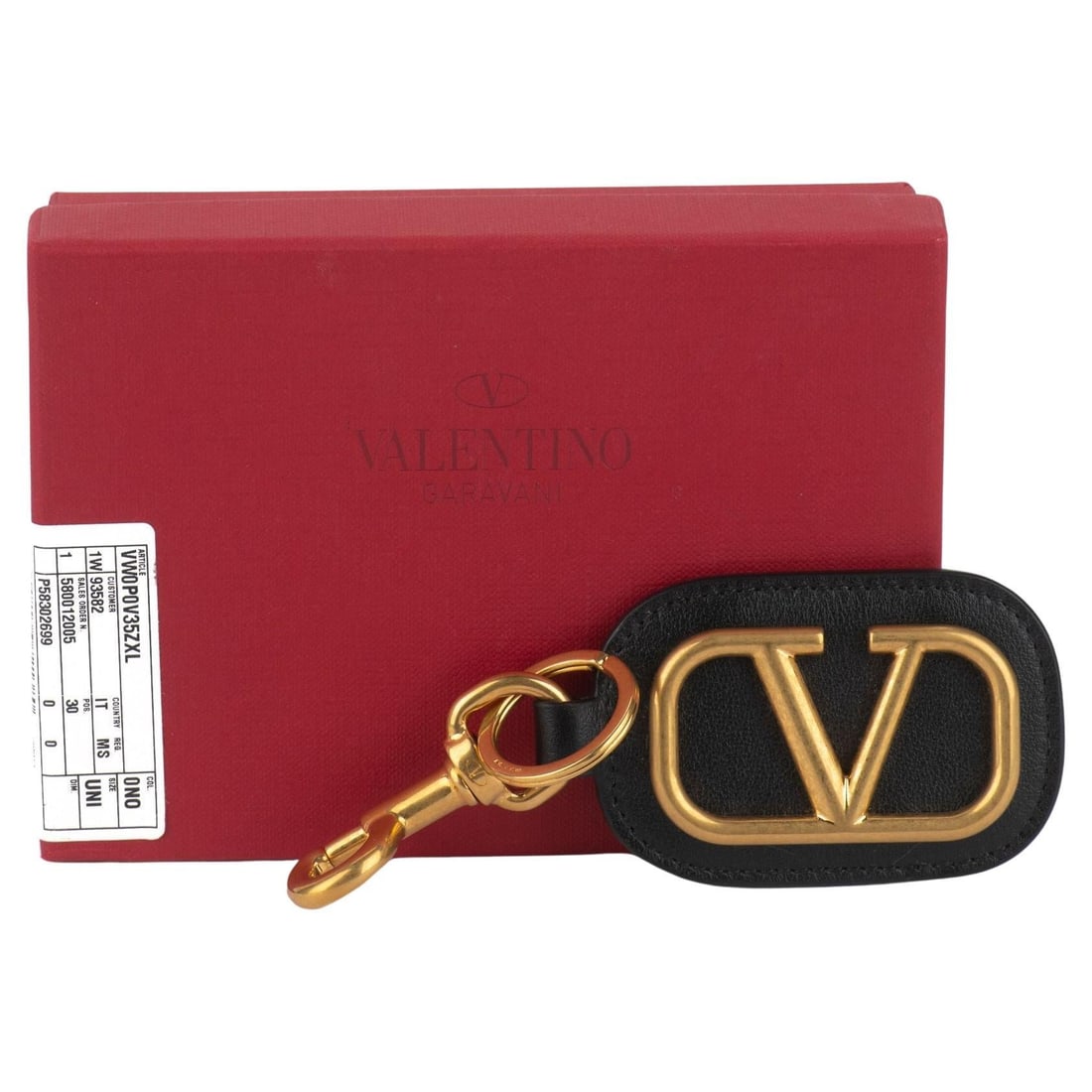 Valentino Roma Black Leather Keychain with Antique Gold Tone: Valentino Roma Black Leather Keychain with Antique Gold Tone This Valentino keychain showcases an elegant design with a striking black leather finish complemented by antique gold tone hardware. Measur
