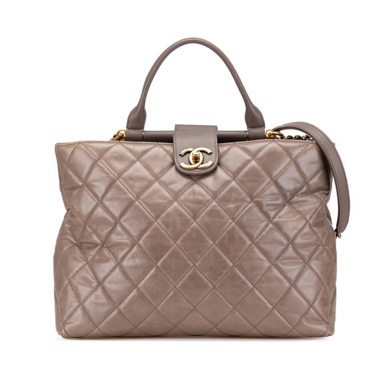 Grey Leather Tote Bag with CC Logo by Chanel: Grey Leather Tote Bag with CC Logo by Chanel This Chanel Logo CC bag is crafted from grey leather and designed for women. It features the iconic CC logo and offers a spacious interior. The bag shows s