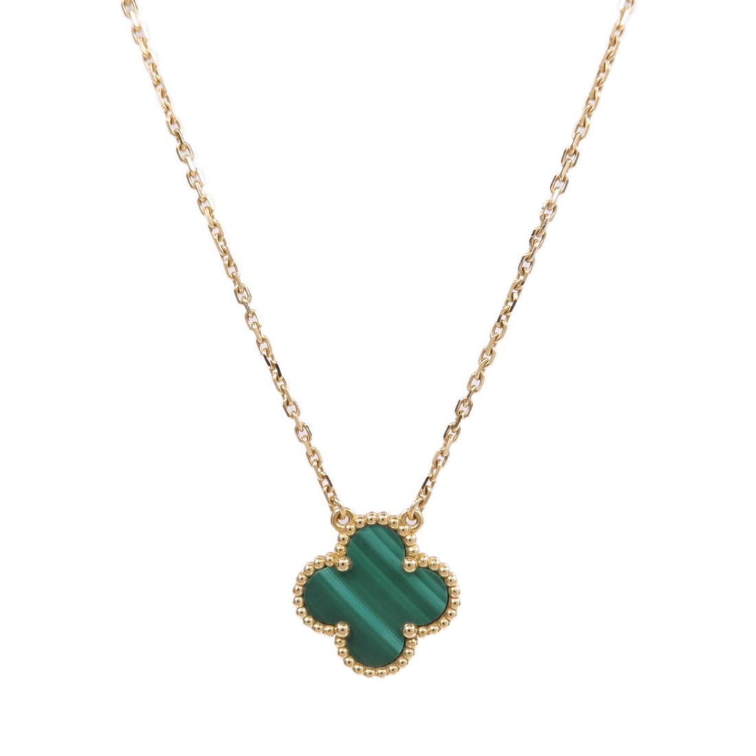 Van Cleef Arpels Vintage Alhambra Malachite Pendant Necklace 18K Yellow Gold: Van Cleef Arpels Vintage Alhambra Malachite Pendant Necklace 18K Yellow Gold This Van Cleef & Arpels Vintage Alhambra pendant necklace features a signature clover motif crafted in 18K yellow gold, acc