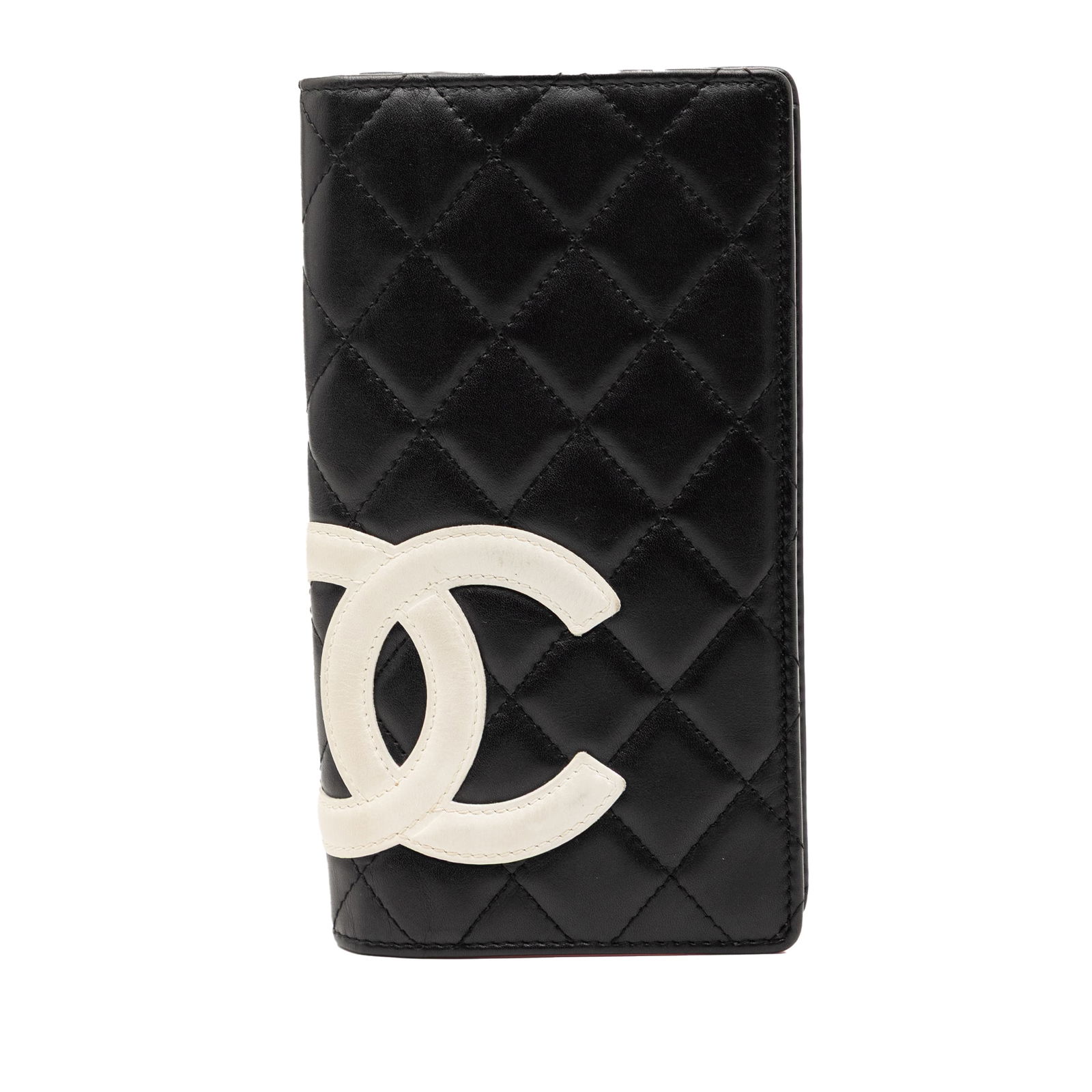 Chanel Cambon Ligne Quilted Lambskin Leather Bifold Wallet Black: Chanel Cambon Ligne Quilted Lambskin Leather Bifold Wallet Black This Chanel Cambon Ligne bifold wallet features a quilted lambskin leather exterior in black. The wallet is designed with both zip and