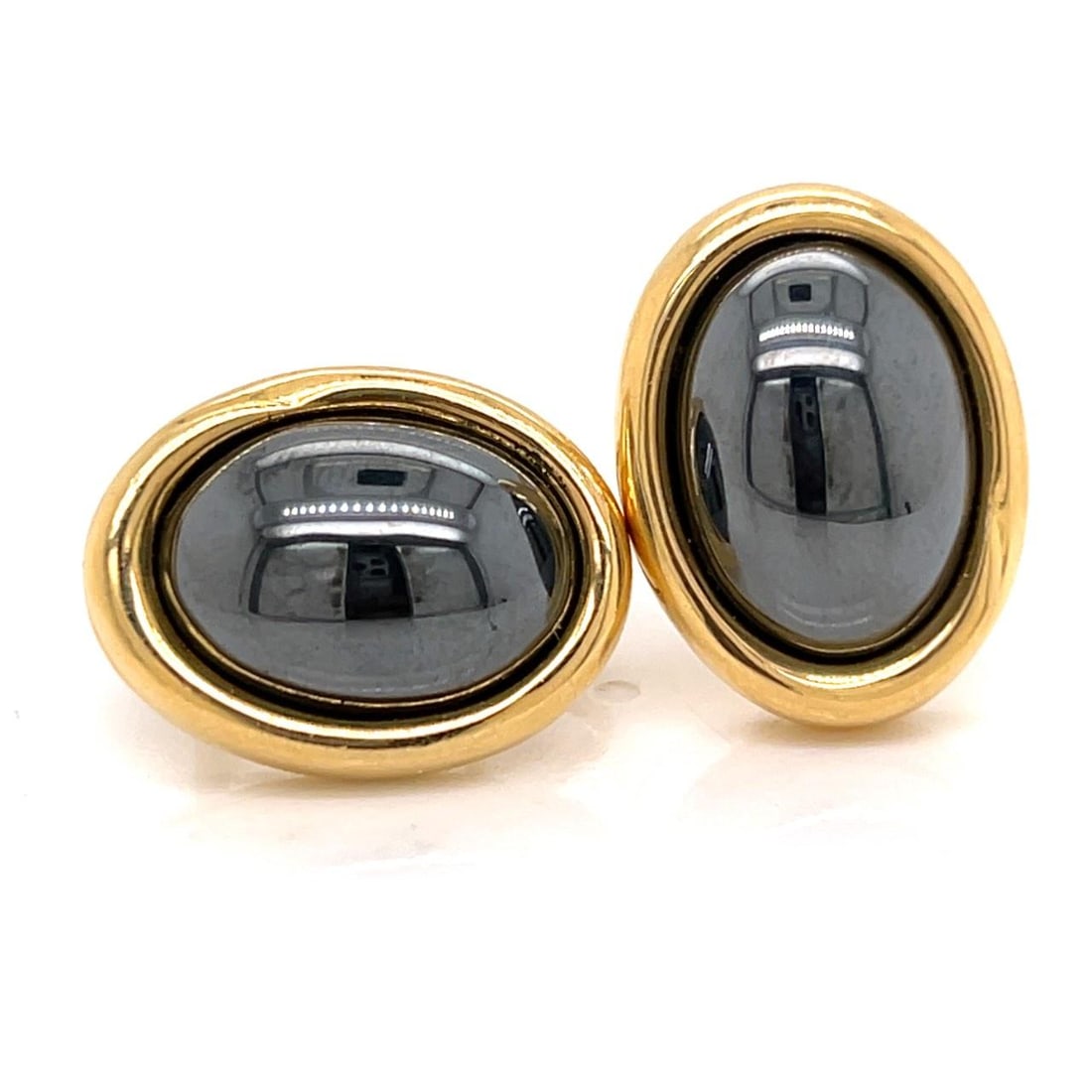 18K Gold Hematite Earrings from Tiffany and Co: 18K Gold Hematite Earrings from Tiffany and Co Elegant Tiffany & Co. earrings crafted from 18K yellow gold and featuring hematite stones. These earrings have a length of 1 inch and a total weight of 2