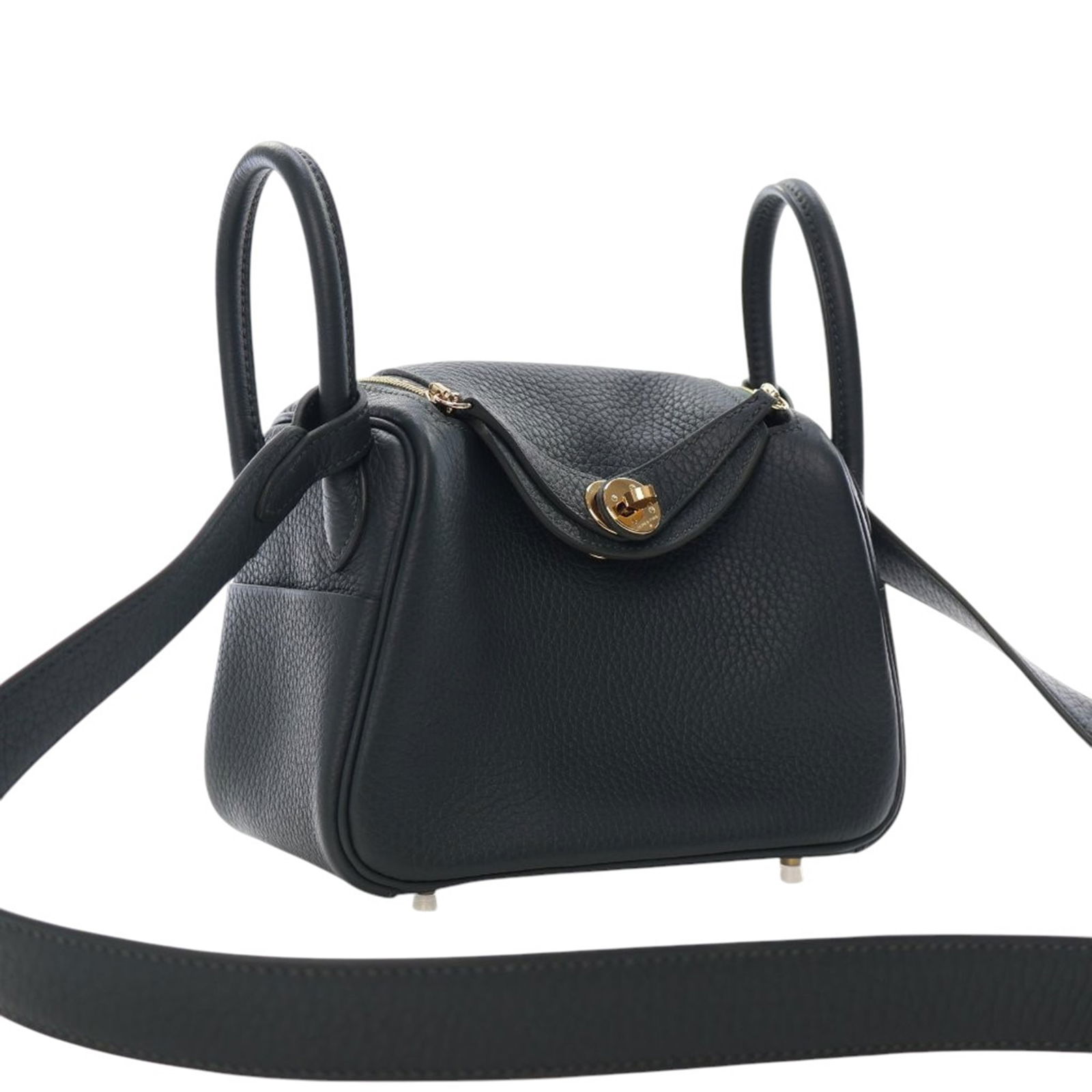 Hermes Mini Lindy 20 Vert Mangrove Clemence Leather Shoulder Bag: Hermes Mini Lindy 20 Vert Mangrove Clemence Leather Shoulder Bag The Mini Lindy 20 features Clemence leather in Vert Mangrove green, with rolled leather handles, a flat leather strap, exterior side sl