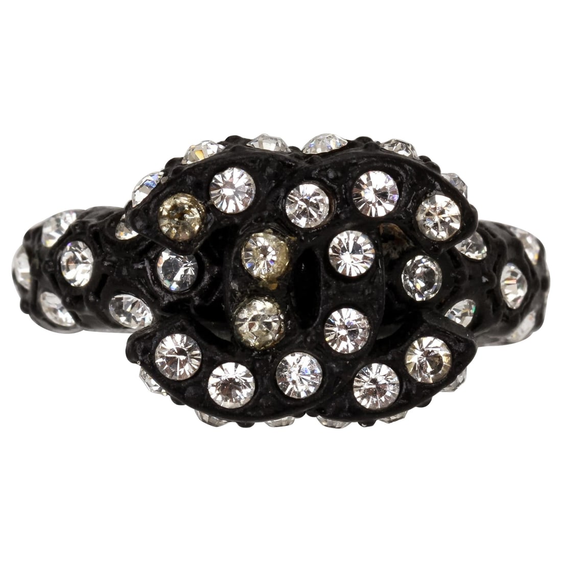 Chanel Black CC Logo Rhinestone Ring 2002 Size 6 with Velvet Pouch: Chanel Black CC Logo Rhinestone Ring 2002 Size 6 with Velvet Pouch This exquisite Chanel ring features the iconic interlocking CC logo adorned with sparkling black metal rhinestones. A size 6 (51.9 mm