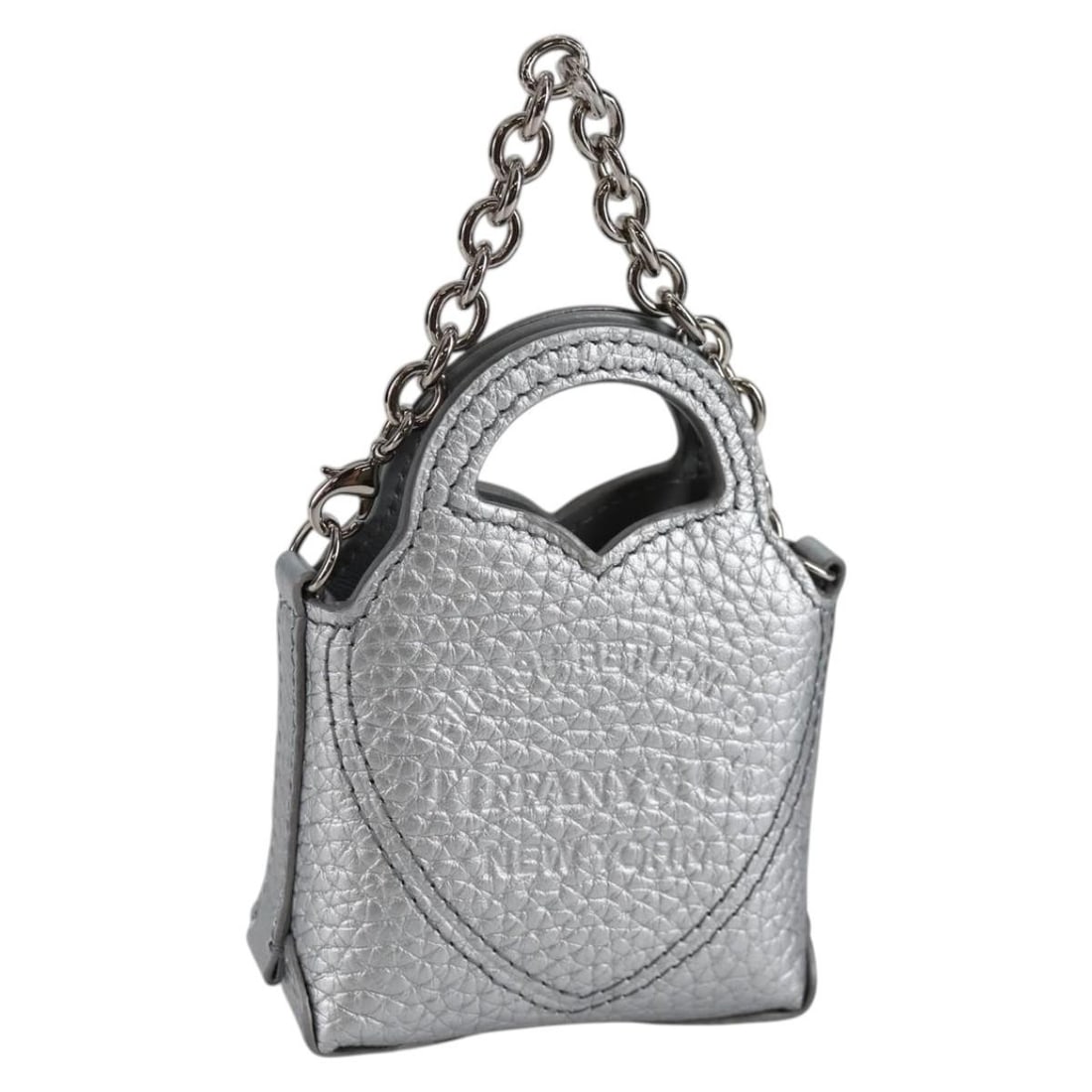 TIFFANY&Co. Silver Leather Return To Micro Tote Charm Italy: TIFFANY&Co. Silver Leather Return To Micro Tote Charm Italy This elegant Tiffany & Co. Return To Micro Tote Charm is crafted from high-quality leather in a stunning silver color. Measuring approximate