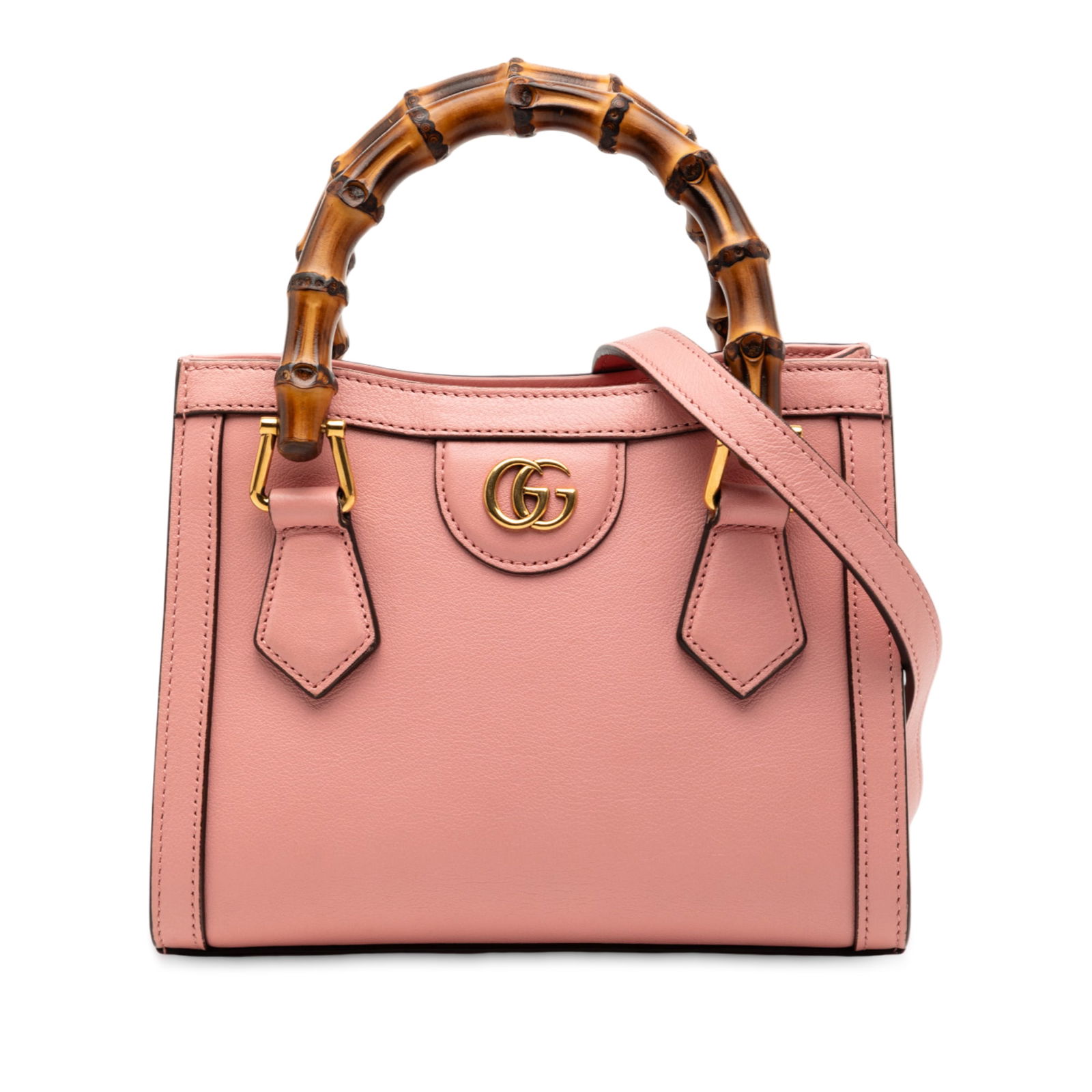 Pink Leather Gucci Diana Mini Bag with Bamboo Handles and Strap: Pink Leather Gucci Diana Mini Bag with Bamboo Handles and Strap This Gucci Mini Calfskin Bamboo Diana Satchel features a pink leather body with distinctive bamboo handles, a detachable flat leather sh