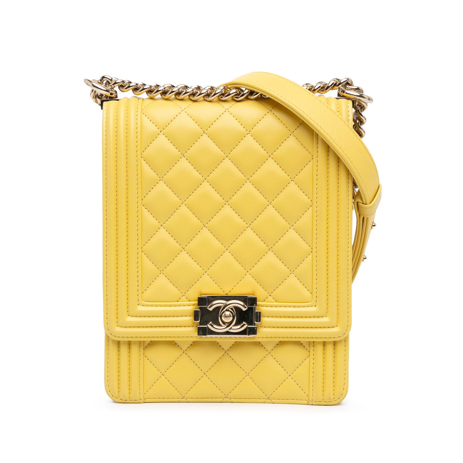 Chanel Yellow Quilted Lambskin North South Boy Flap Bag: Chanel Yellow Quilted Lambskin North South Boy Flap Bag The Chanel Quilted Lambskin North South Boy Flap is a stylish and functional bag crafted from premium lambskin leather. It features a distinctiv