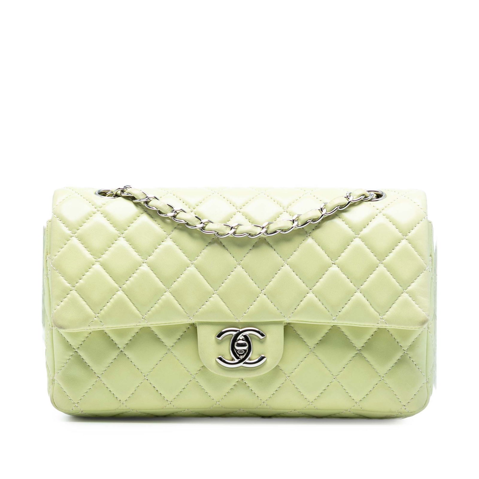 Chanel Medium Classic Double Flap Green Lambskin Bag: Chanel Medium Classic Double Flap Green Lambskin Bag The Chanel Medium Classic Lambskin Double Flap is a luxurious shoulder bag crafted from quilted lambskin leather in an elegant green hue. It featur