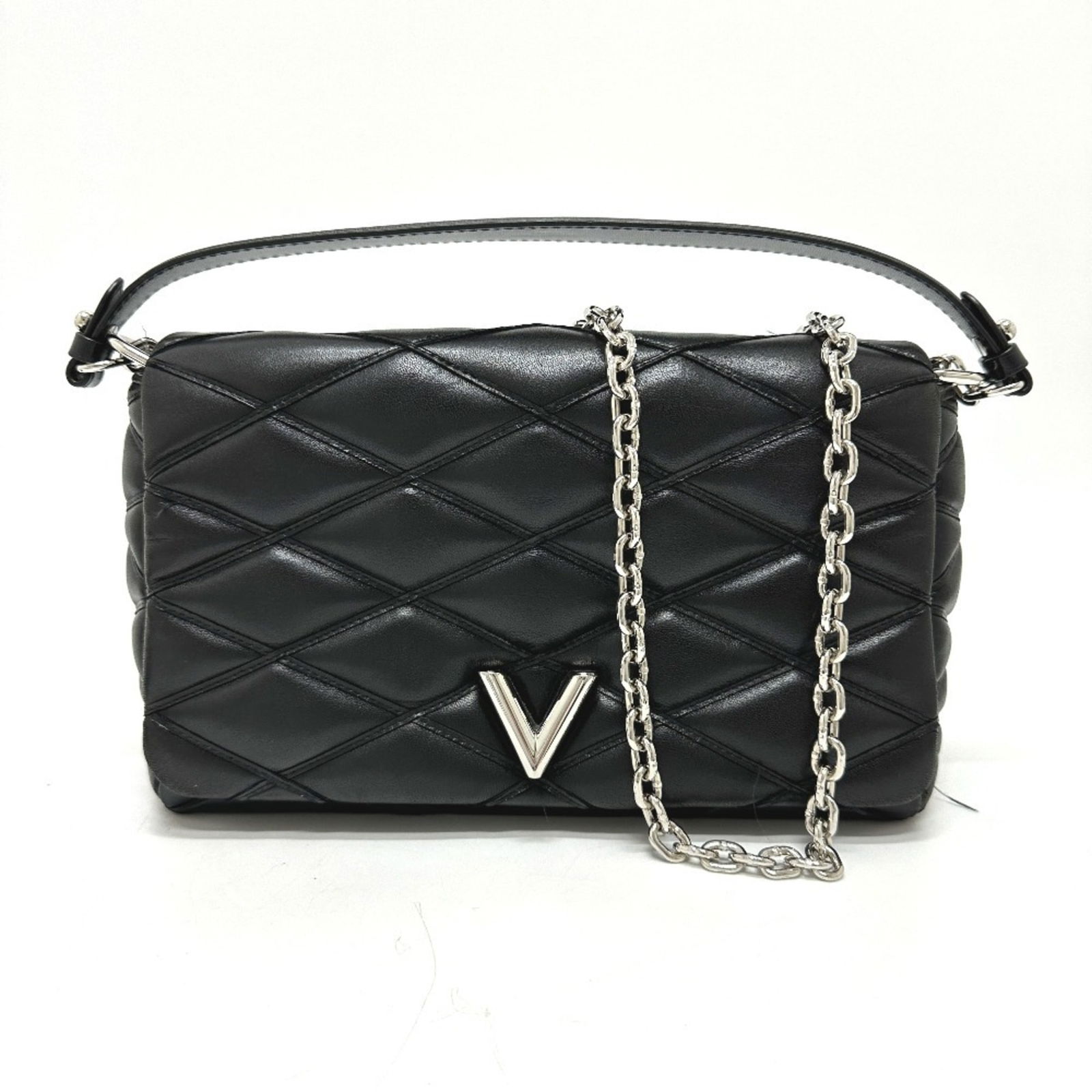 Black Leather Louis Vuitton Malletage Handbag France: Black Leather Louis Vuitton Malletage Handbag France This Louis Vuitton Malletage handbag features a black leather exterior and is designed for women. Made in France, it showcases a structured silhoue