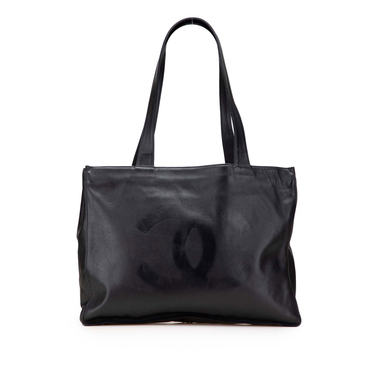 Chanel CC Lambskin Tote Black Leather Bag with Zip Compartment: Chanel CC Lambskin Tote Black Leather Bag with Zip Compartment This Chanel CC Lambskin Tote combines elegance with functionality. Made from luxurious black lambskin leather, it features flat leather h