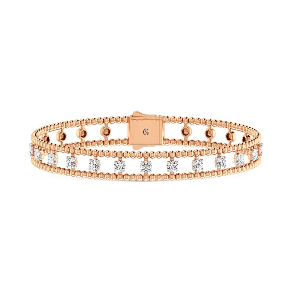 14K Rose Gold Lab Grown Yellow and White Diamond 1 1/3 Ct.Tw Flexi Bangle: 14K Rose Gold Lab Grown Yellow and White Diamond 1 1/3 Ct.Tw Flexi Bangle This 14K Rose Gold flexi bangle features lab grown yellow and white diamonds totaling 1 1/3 Ct.Tw., offering stylish and vibra