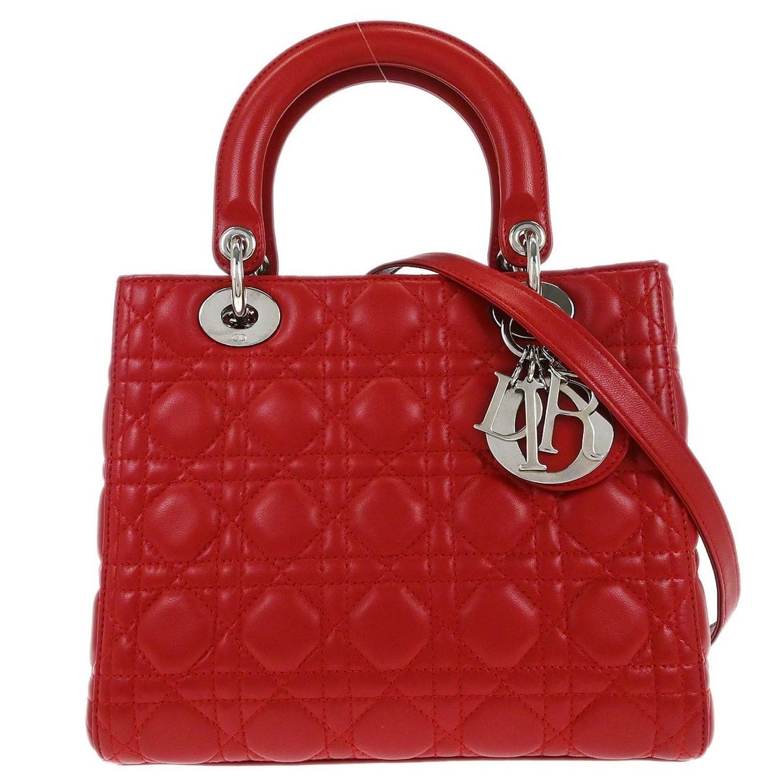Lady Dior Cannage Red Lambskin Medium Satchel with Shoulder Strap: Lady Dior Cannage Red Lambskin Medium Satchel with Shoulder Strap This Christian Dior Lady Dior handbag is crafted from red lambskin leather and features the signature Dior Cannage quilted pattern. De