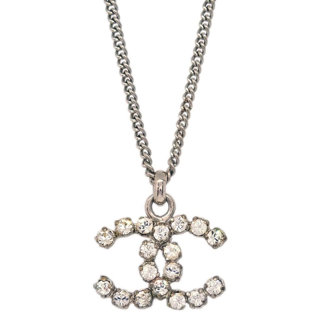 Chanel CC Pendant Chain Necklace Silver Plated Rhinestone 05V: Chanel CC Pendant Chain Necklace Silver Plated Rhinestone 05V Elevate your accessory collection with this stunning Chanel CC Chain Necklace Pendant. Crafted from silver-plated material, this elegant p