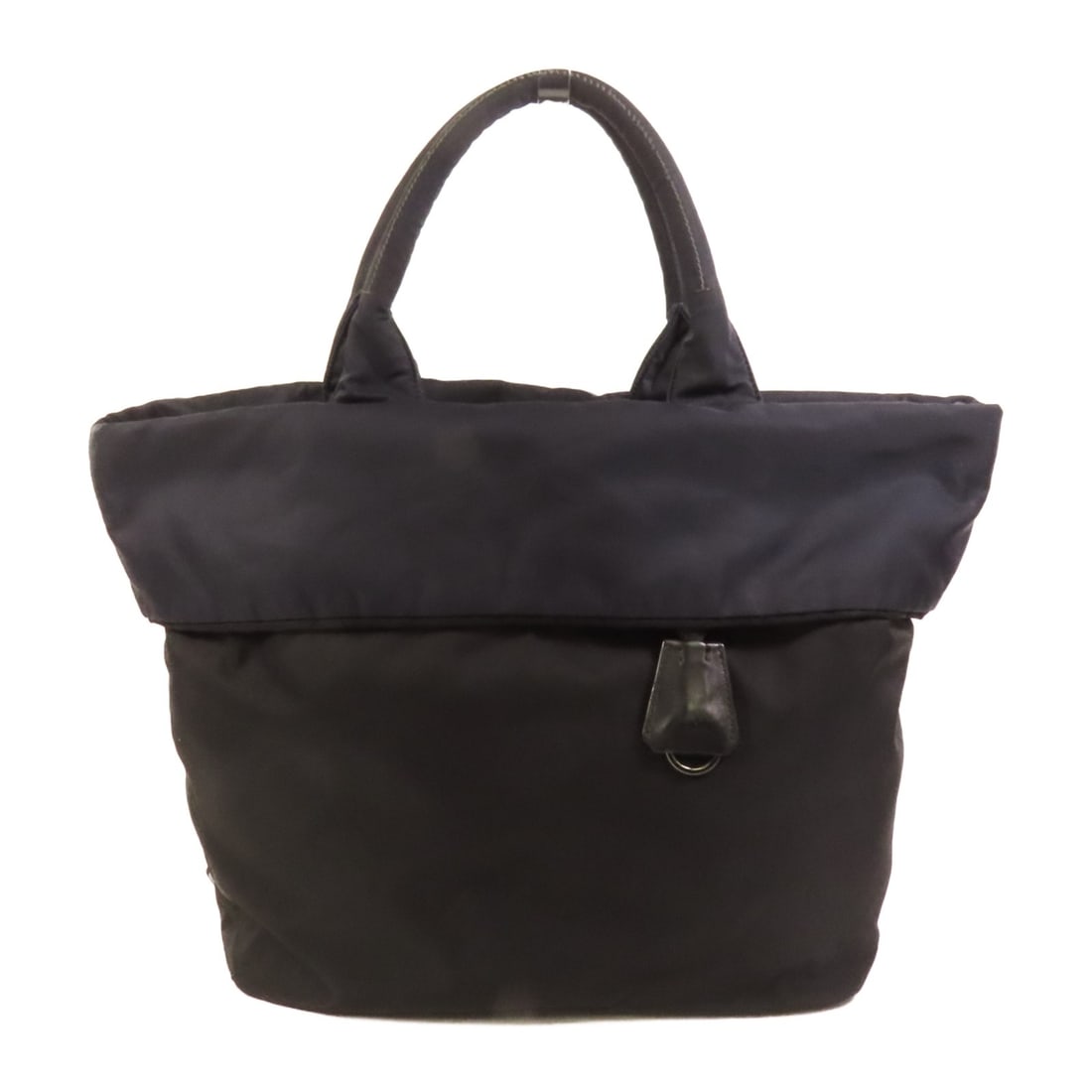 Prada BR4521 Navy and Black Nylon Reversible Tote Handbag: Prada BR4521 Navy and Black Nylon Reversible Tote Handbag This PRADA reversible tote bag features a versatile design crafted from durable nylon in navy and black. Made in Italy, it offers both style a