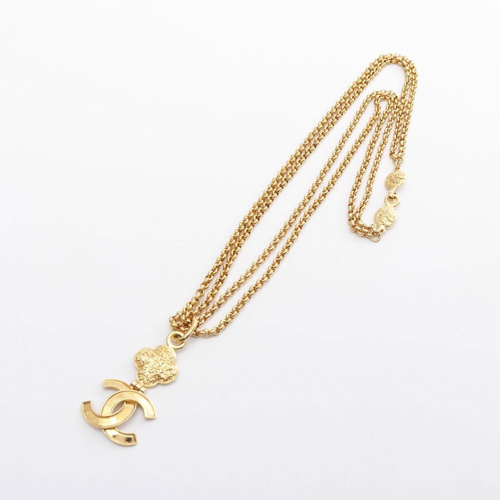 Chanel Gold Plated Coco Mark Pendant Necklace 81.5cm: Chanel Gold Plated Coco Mark Pendant Necklace 81.5cm This Chanel Coco Mark necklace features a gold plated finish and a distinctive pendant design. Designed for women, the necklace has a neck circumfe
