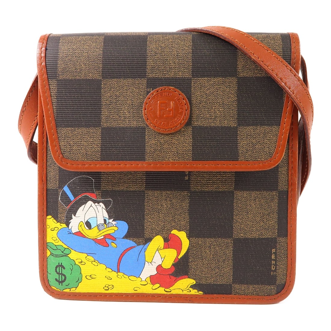 Fendi Vintage Shoulder Bag Brown PVC Coated Canvas: Fendi Vintage Shoulder Bag Brown PVC Coated Canvas This vintage Fendi shoulder bag is crafted from durable PVC coated canvas, showcasing a rich brown exterior. Designed for everyday use, it features a