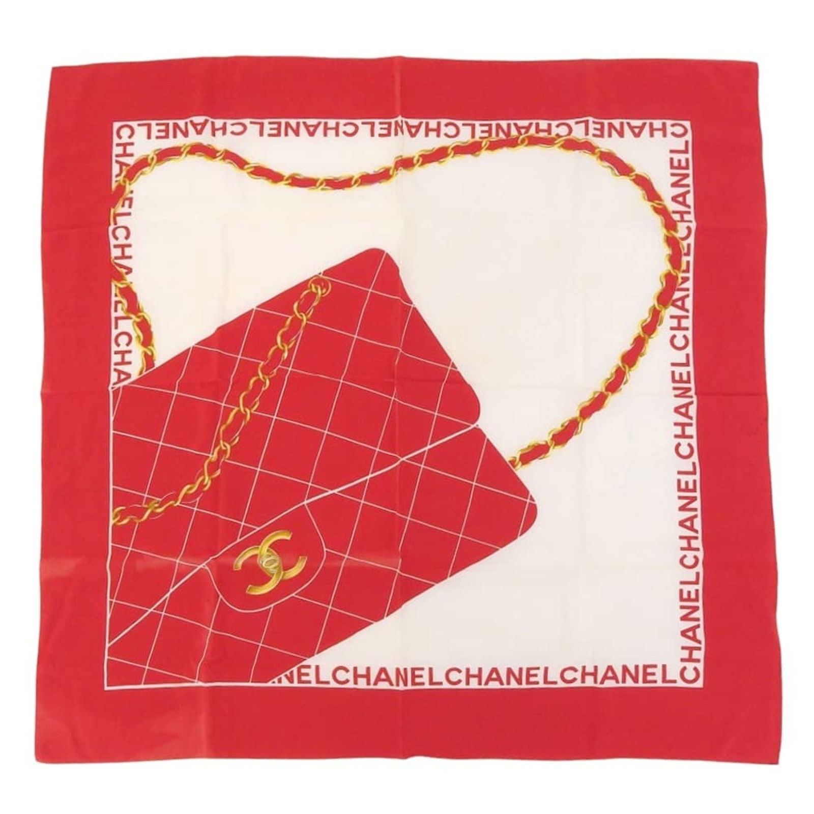 Red silk scarf from Chanel 85cm x 86.5cm France: Red silk scarf from Chanel 85cm x 86.5cm France Chanel red silk scarf designed for women, featuring a square shape with overall slight discoloration, minor stains, and slightly protruding threads at t