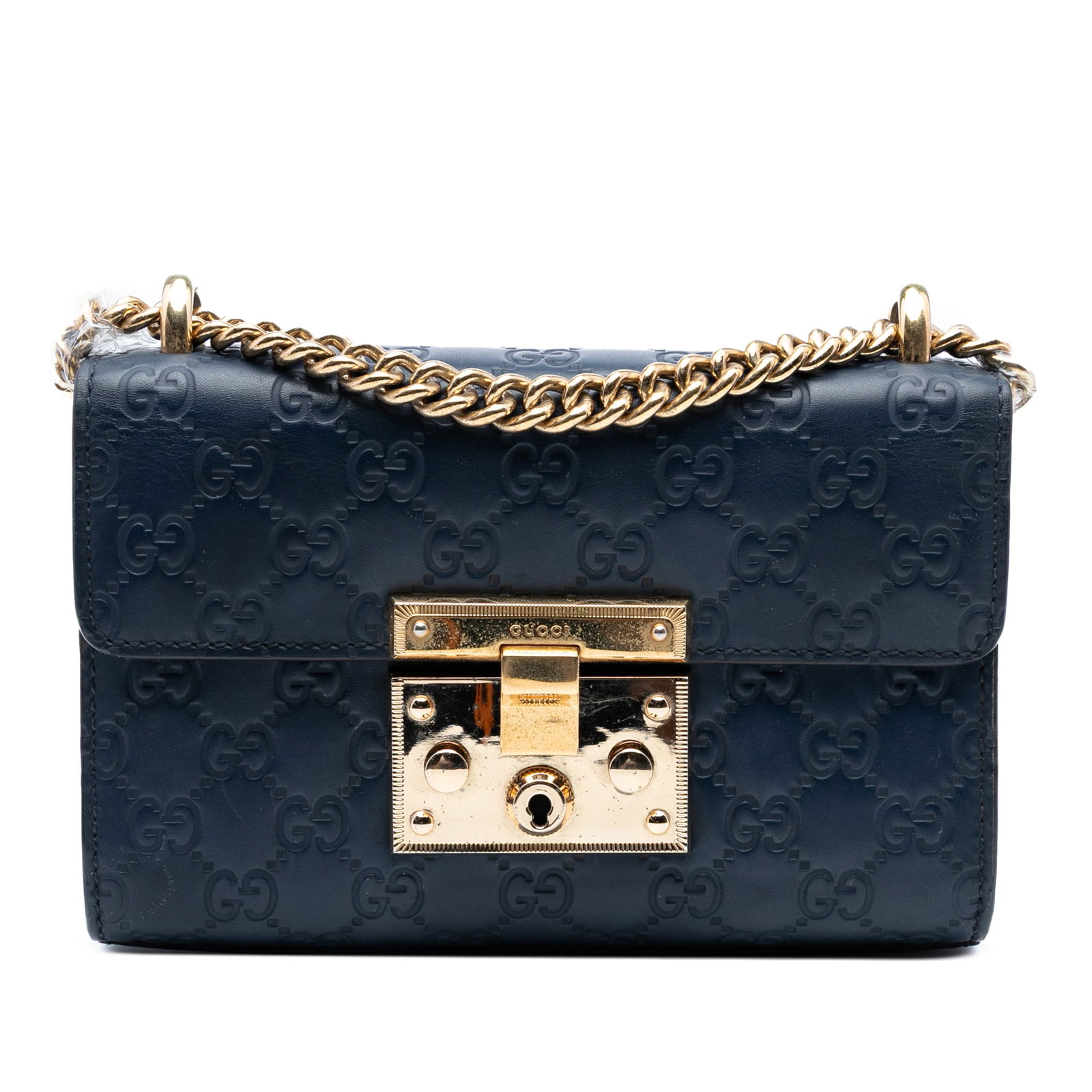 Gucci Small Guccissima Padlock Crossbody Bag Blue Leather: Gucci Small Guccissima Padlock Crossbody Bag Blue Leather This Small Guccissima Padlock Crossbody bag by Gucci showcases an elegant embossed leather exterior in a vibrant blue color. It features a cha