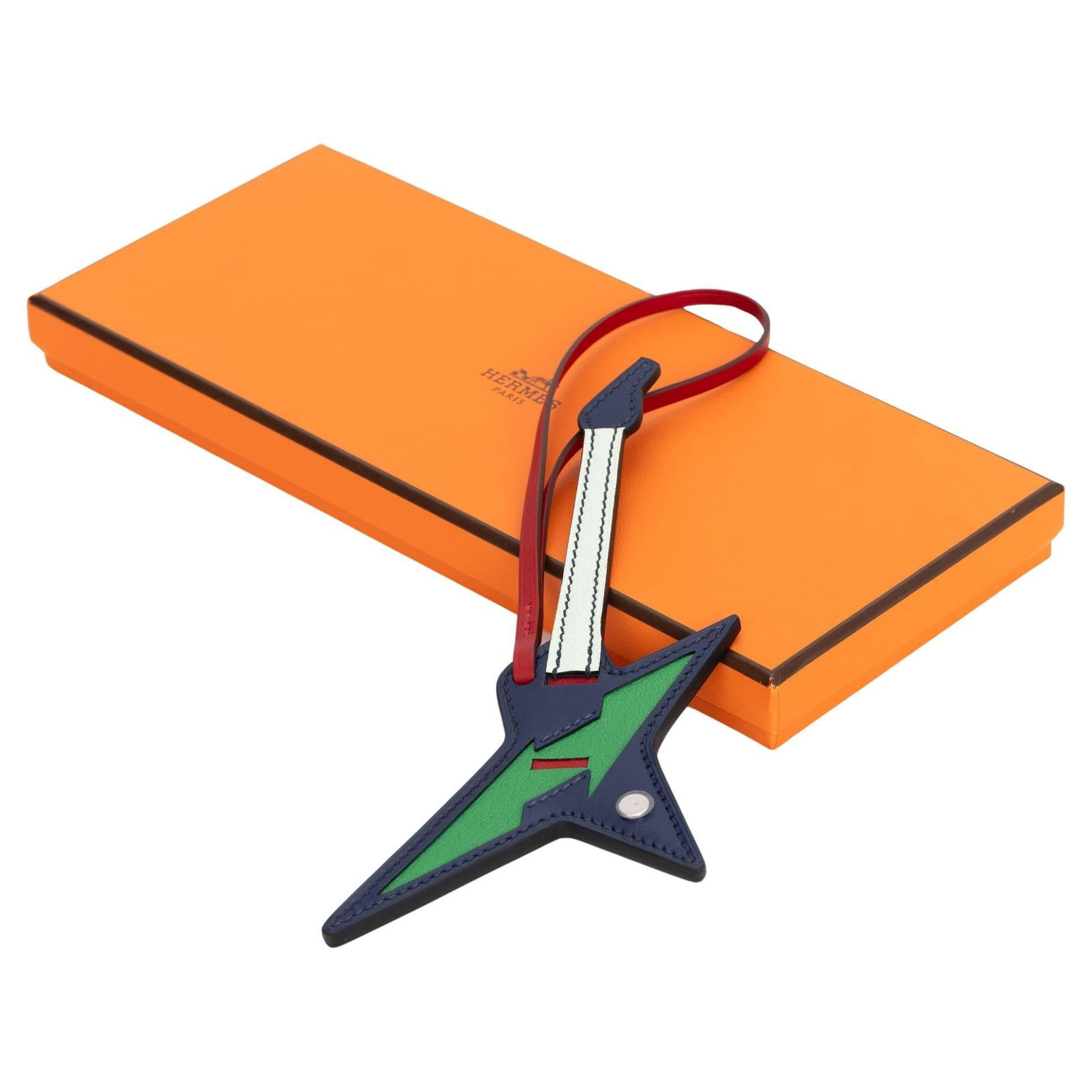 Hermes Guitar Charm Bag 2023 Tadelakt Leather Handbag Accessory: Hermes Guitar Charm Bag 2023 Tadelakt Leather Handbag Accessory Introducing the Hermes Guitar Charm Bag with Pick Tadelakt, a stylish and unique handbag charm accessory. This exquisite piece is crafte