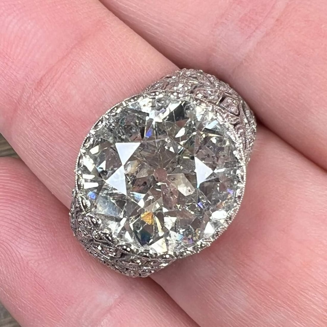 Art Deco Platinum 8.81 Ct Diamond Engagement Ring J Color I1 Clarity: Art Deco Platinum 8.81 Ct Diamond Engagement Ring J Color I1 Clarity This exquisite Art Deco engagement ring features a stunning 8.81 Ct. European-cut diamond, characterized by its brilliant J color a