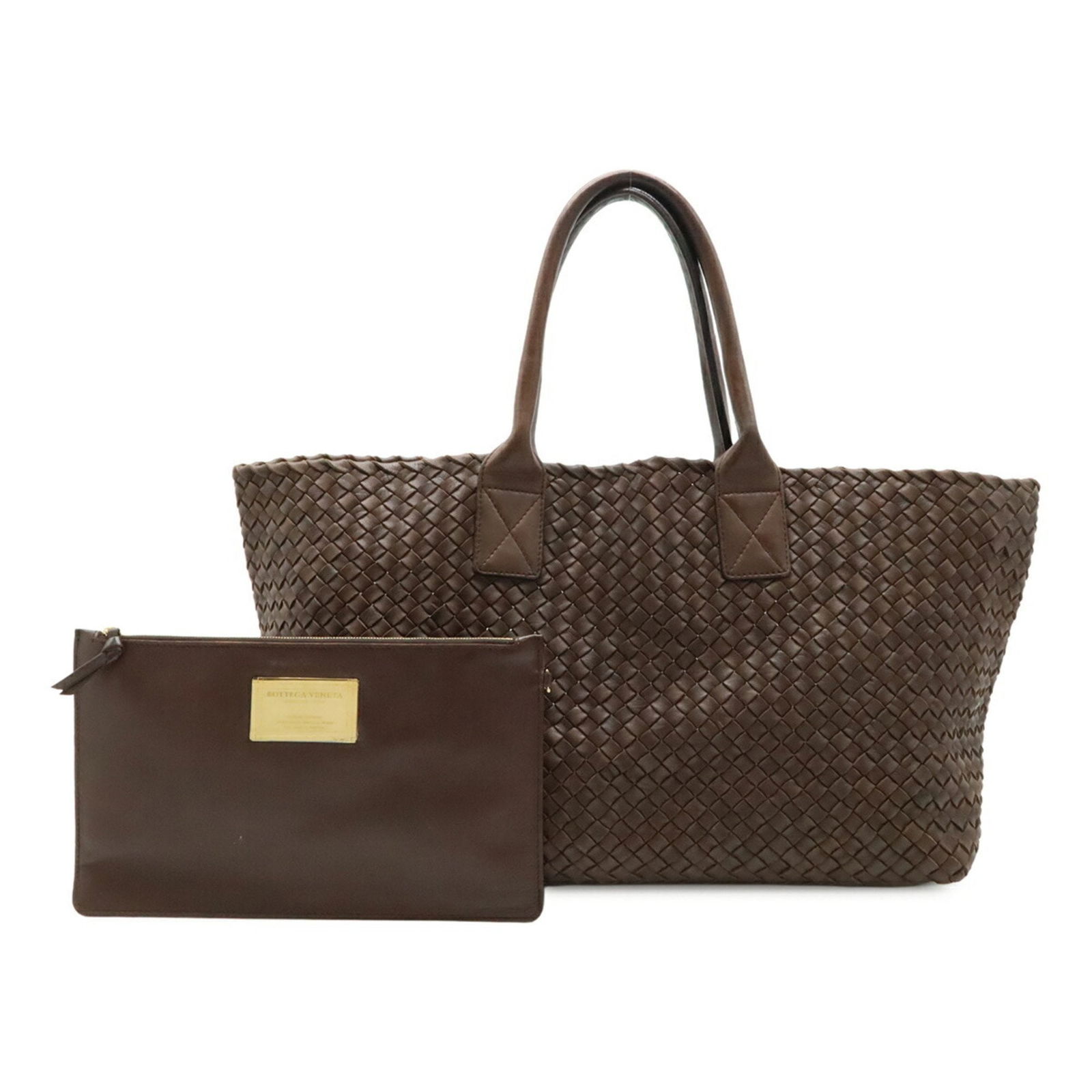 Brown Leather Intrecciato Handbag by Bottega Veneta: Brown Leather Intrecciato Handbag by Bottega Veneta This Bottega Veneta Intrecciato handbag features a rich brown leather exterior with the brand's signature woven design. Designed for women, it offer