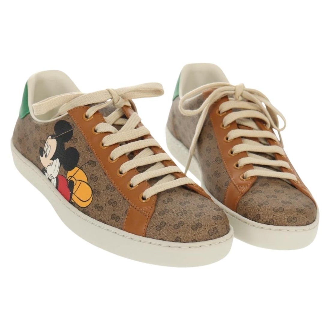 GUCCI Micro GG Canvas Disney Sneakers Beige Auth 154167M Italy: GUCCI Micro GG Canvas Disney Sneakers Beige Auth 154167M Italy Step out in style with these GUCCI Micro GG Canvas Disney Collaboration Sneakers. Crafted in Italy, these sneakers feature a chic beige u