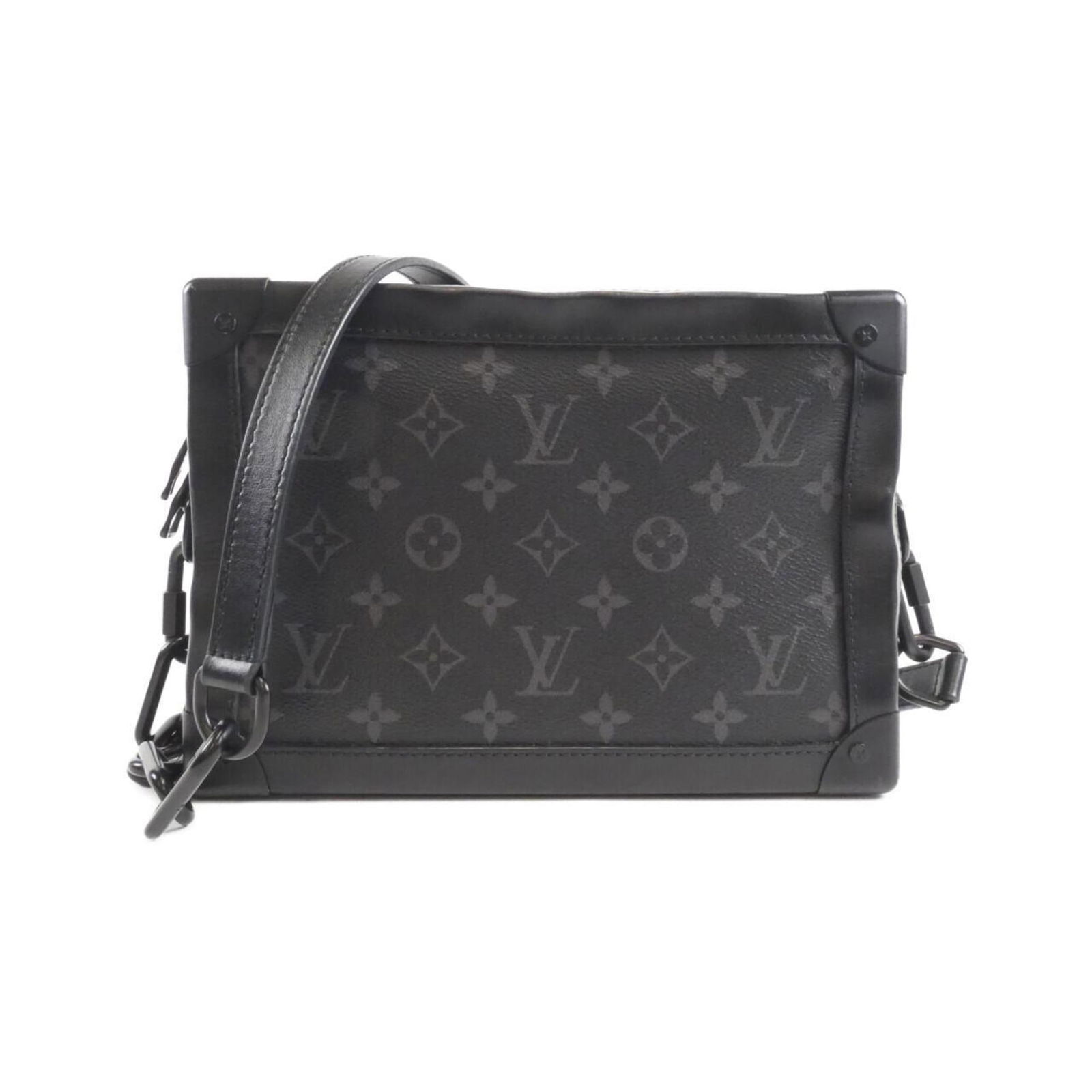 Black Canvas Soft Trunk Bag by Louis Vuitton with 18cm x 25cm x 10cm Dimensions: Black Canvas Soft Trunk Bag by Louis Vuitton with 18cm x 25cm x 10cm Dimensions This Louis Vuitton Soft Trunk bag is crafted from black canvas and designed for unisex use. Made in France, the bag feat