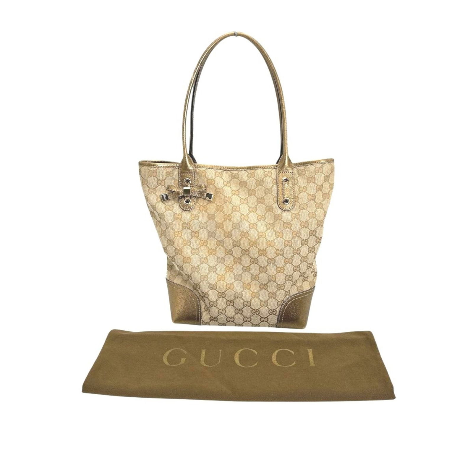 Gucci Princy beige canvas handbag made in Italy: Gucci Princy beige canvas handbag made in Italy This Gucci Princy bag features a beige canvas exterior with a classic design. Made in Italy, it offers a stylish option for everyday use. The bag is sui