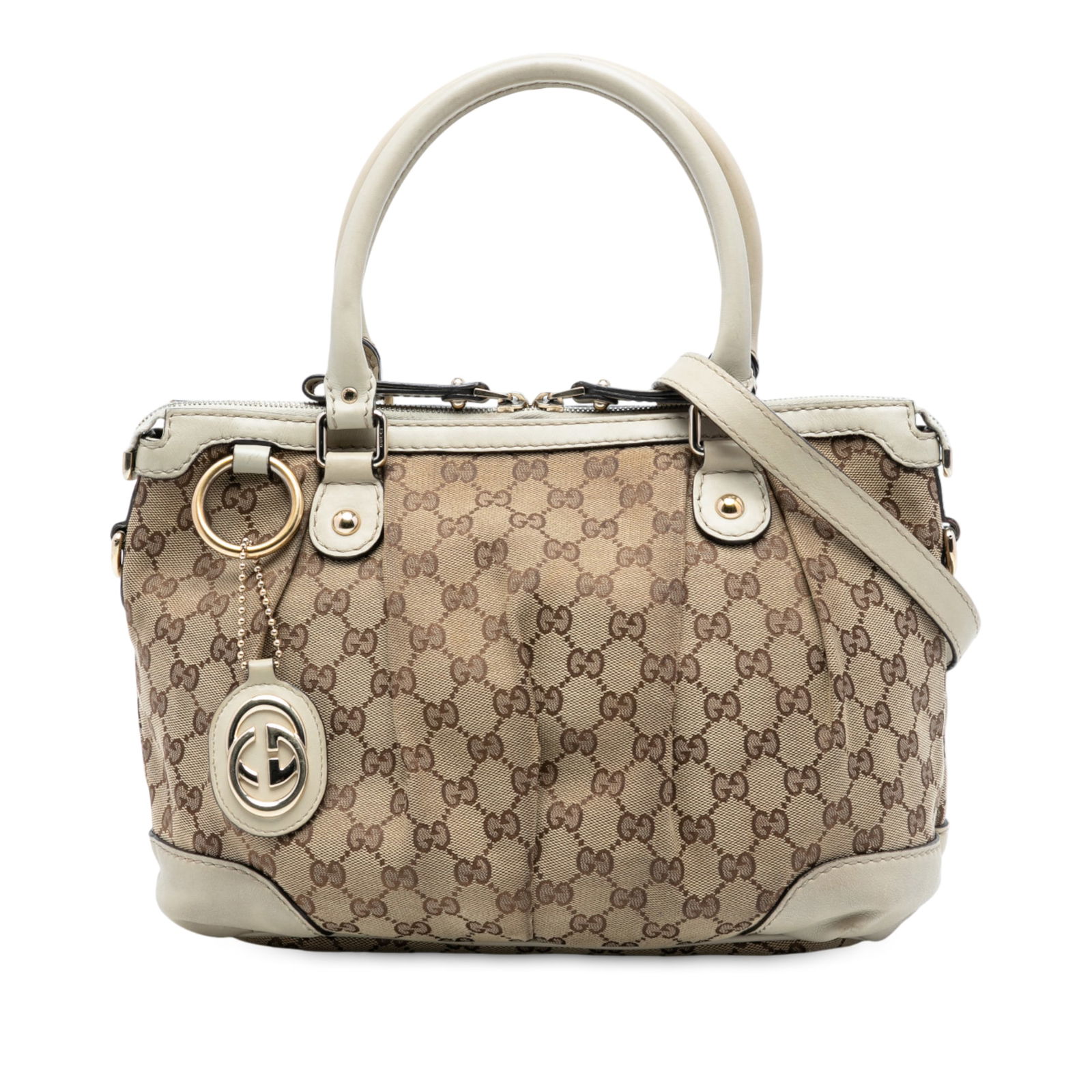 Gucci Brown GG Canvas Sukey Satchel with Leather Trim and Shoulder Strap: Gucci Brown GG Canvas Sukey Satchel with Leather Trim and Shoulder Strap This Gucci GG Canvas Sukey Satchel features a brown canvas body with leather trim, rolled leather handles, a detachable flat le