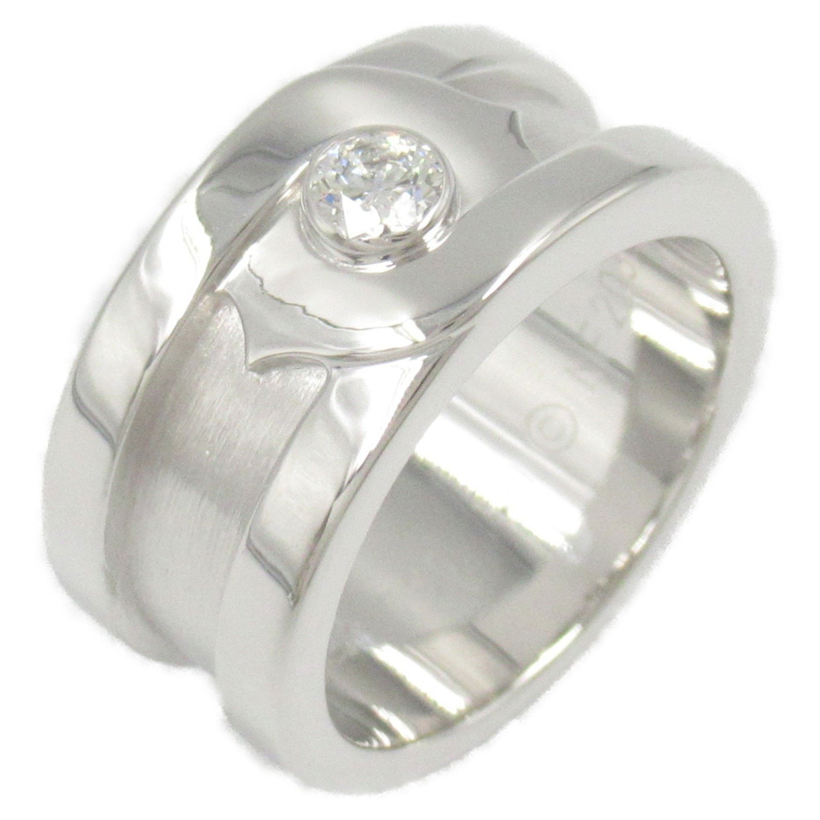 White Gold Cartier C2 Ring Size 5 Silver Tone French Design: White Gold Cartier C2 Ring Size 5 Silver Tone French Design Cartier C2 ring crafted from white gold in a size 5, designed for women. The ring features a silver tone and originates from France. The mai
