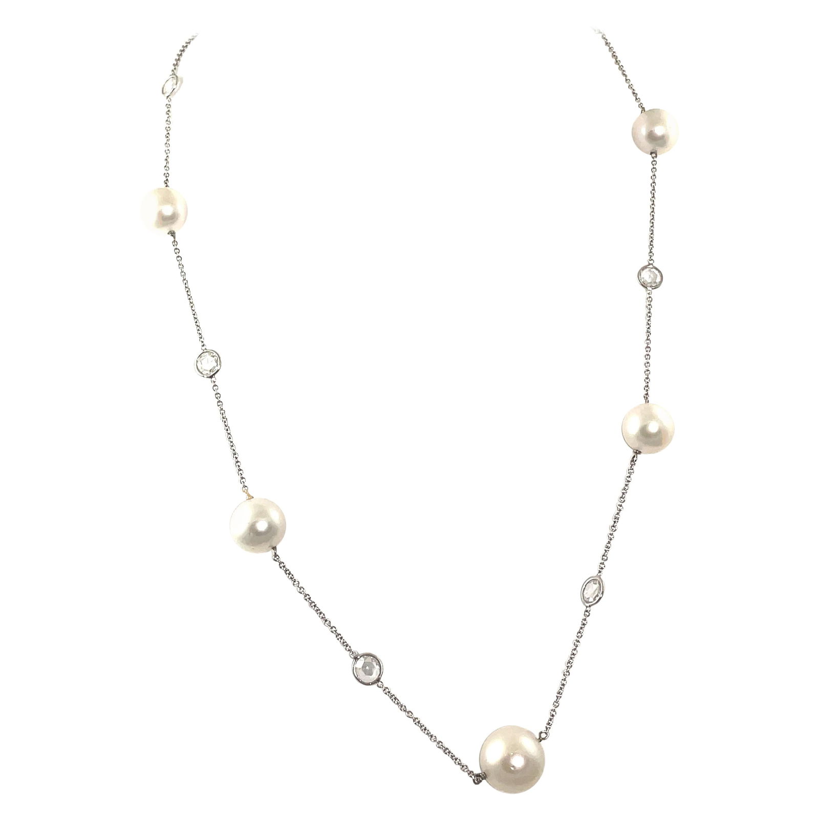 22 Inch 2.47ct Rose Cut Diamonds and Pearls 18k White Gold Necklace: 22 Inch 2.47ct Rose Cut Diamonds and Pearls 18k White Gold Necklace This exquisite piece features a stunning arrangement of rose cut diamonds and pearls by the yard, crafted in 18k white gold. The nec