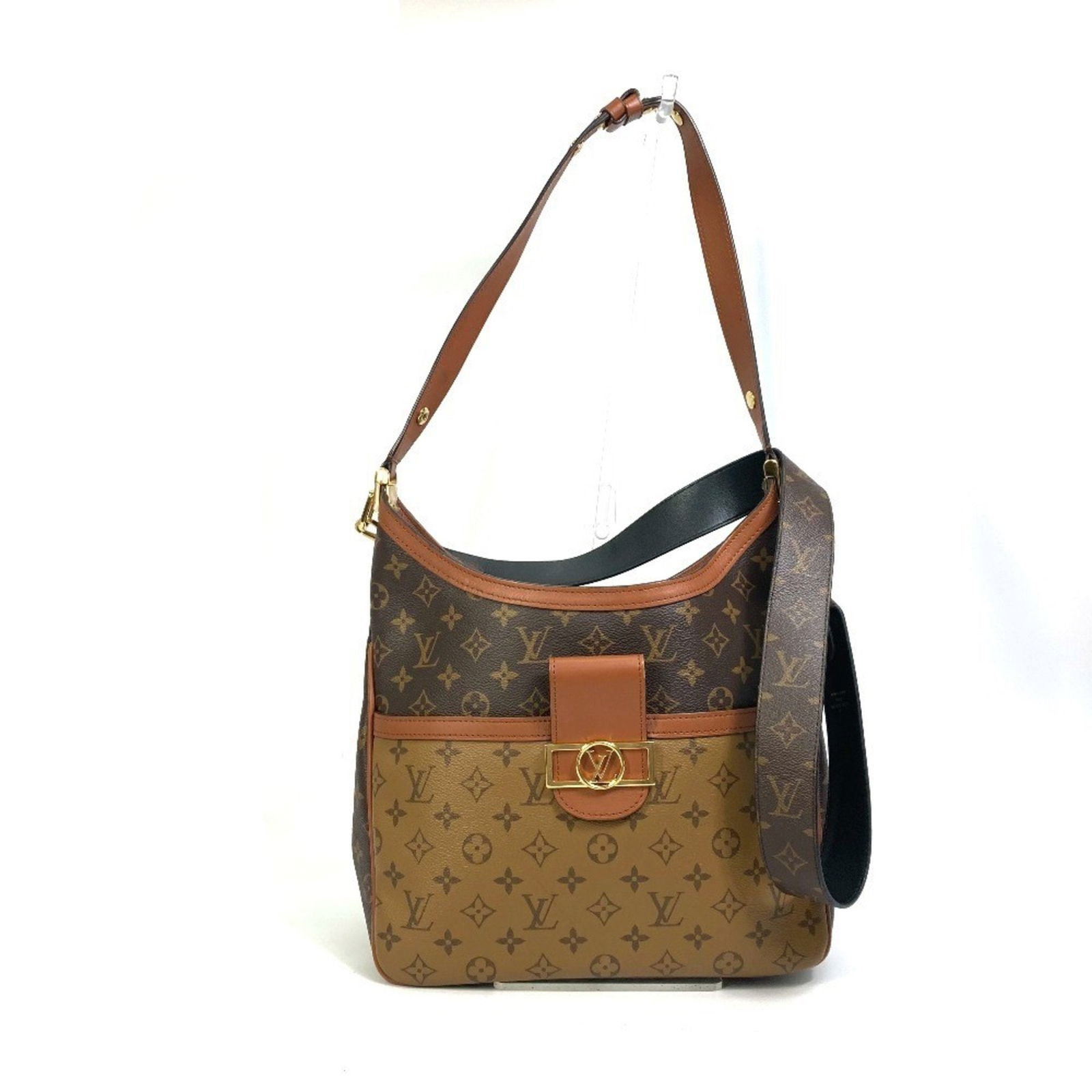 Louis Vuitton Dauphine Brown Canvas Shoulder Bag France: Louis Vuitton Dauphine Brown Canvas Shoulder Bag France The Louis Vuitton Dauphine is a women's bag crafted from brown canvas. It features a structured design with a 25cm x 33.5cm x 14cm body and a st