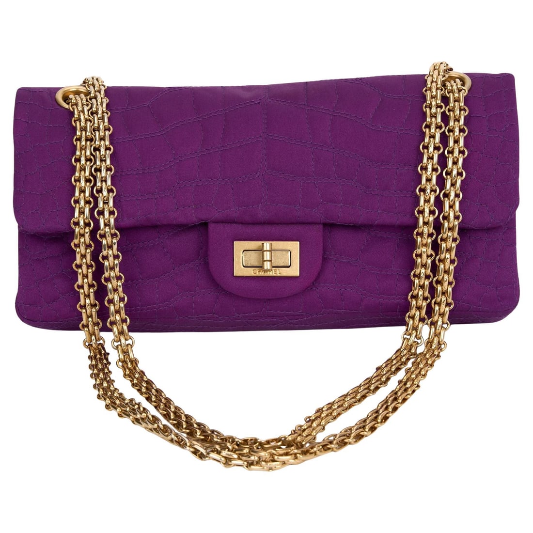Chanel Purple Crocodile Satin 2.55 Reissue Flap Bag with Gold Hardware: Chanel Purple Crocodile Satin 2.55 Reissue Flap Bag with Gold Hardware Introducing the Chanel Croco-Quilted Reissue Flap Bag, a stunning accessory that exemplifies luxury and style. This exquisite bag