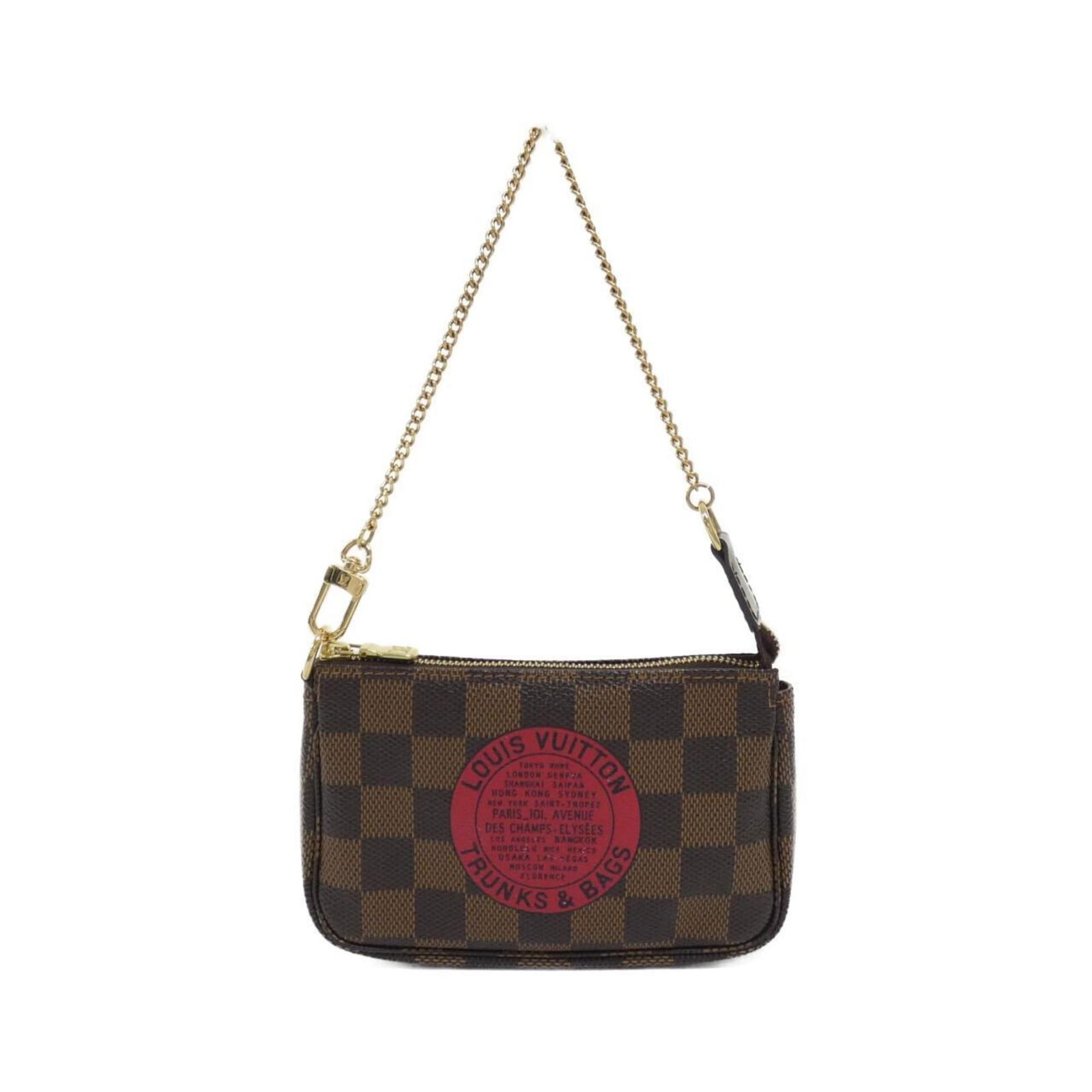 Mini Pochette Accessoires Canvas Clutch by Louis Vuitton in Brown: Mini Pochette Accessoires Canvas Clutch by Louis Vuitton in Brown This Louis Vuitton Mini Pochette Accessoires is crafted from brown canvas and designed for women. Made in France, it features compact