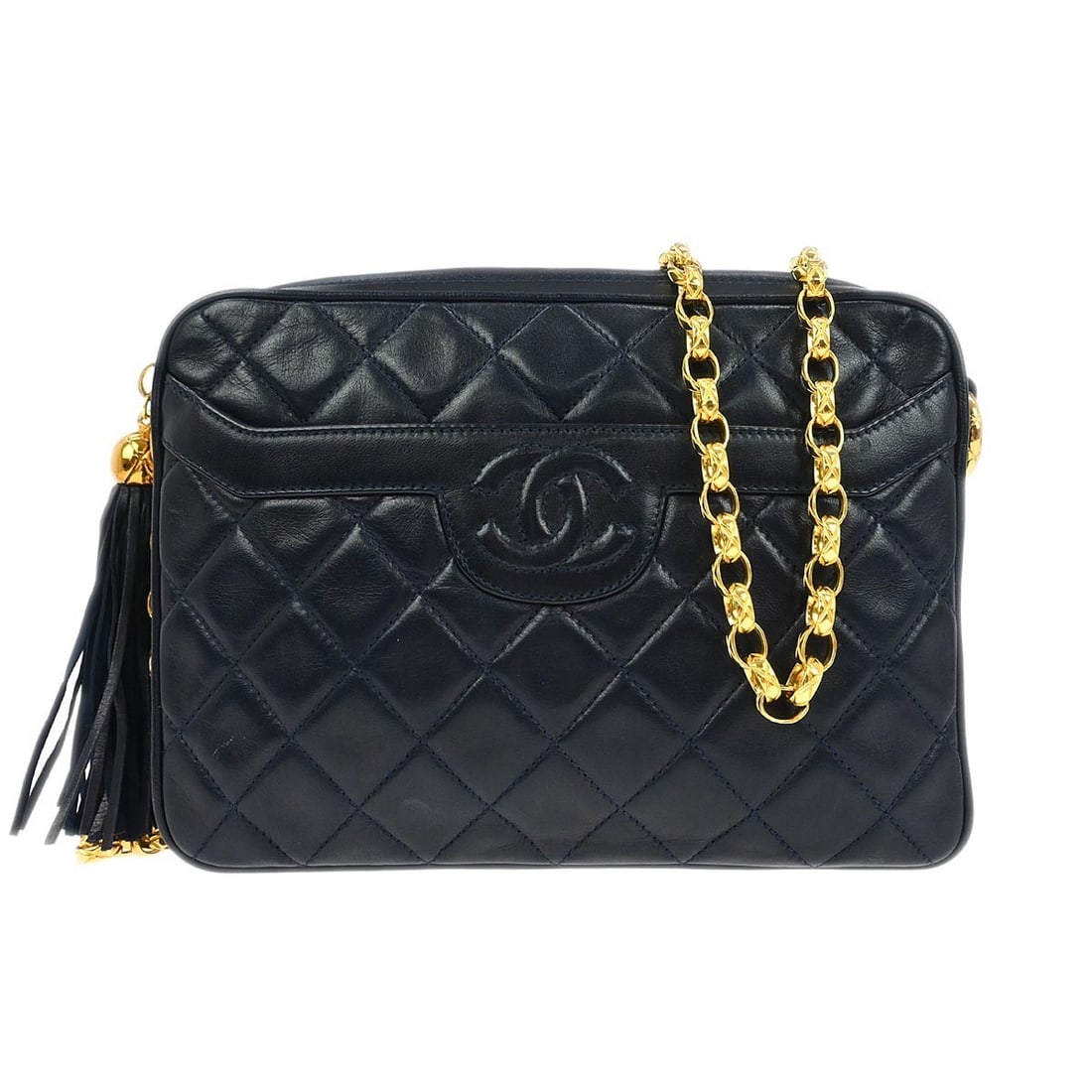 Small Navy Quilted Lambskin Crossbody Chain Shoulder Bag by Chanel: Small Navy Quilted Lambskin Crossbody Chain Shoulder Bag by Chanel This Chanel Navy Lambskin Camera Bag Small features a quilted exterior crafted from lambskin leather with gold-tone hardware accents.