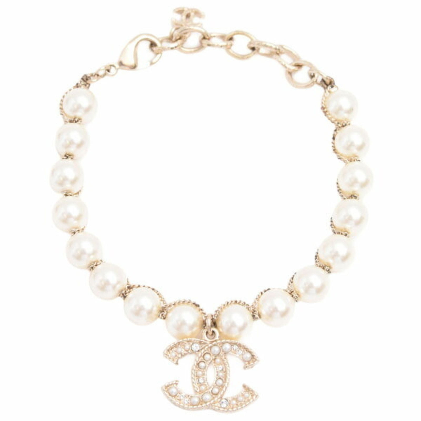 Gold Plated Bracelet by Chanel Coco Mark Adjustable 18cm to 23.3cm: Gold Plated Bracelet by Chanel Coco Mark Adjustable 18cm to 23.3cm This Chanel Coco Mark bracelet features a gold-plated finish and an adjustable length, making it suitable for various wrist sizes. De