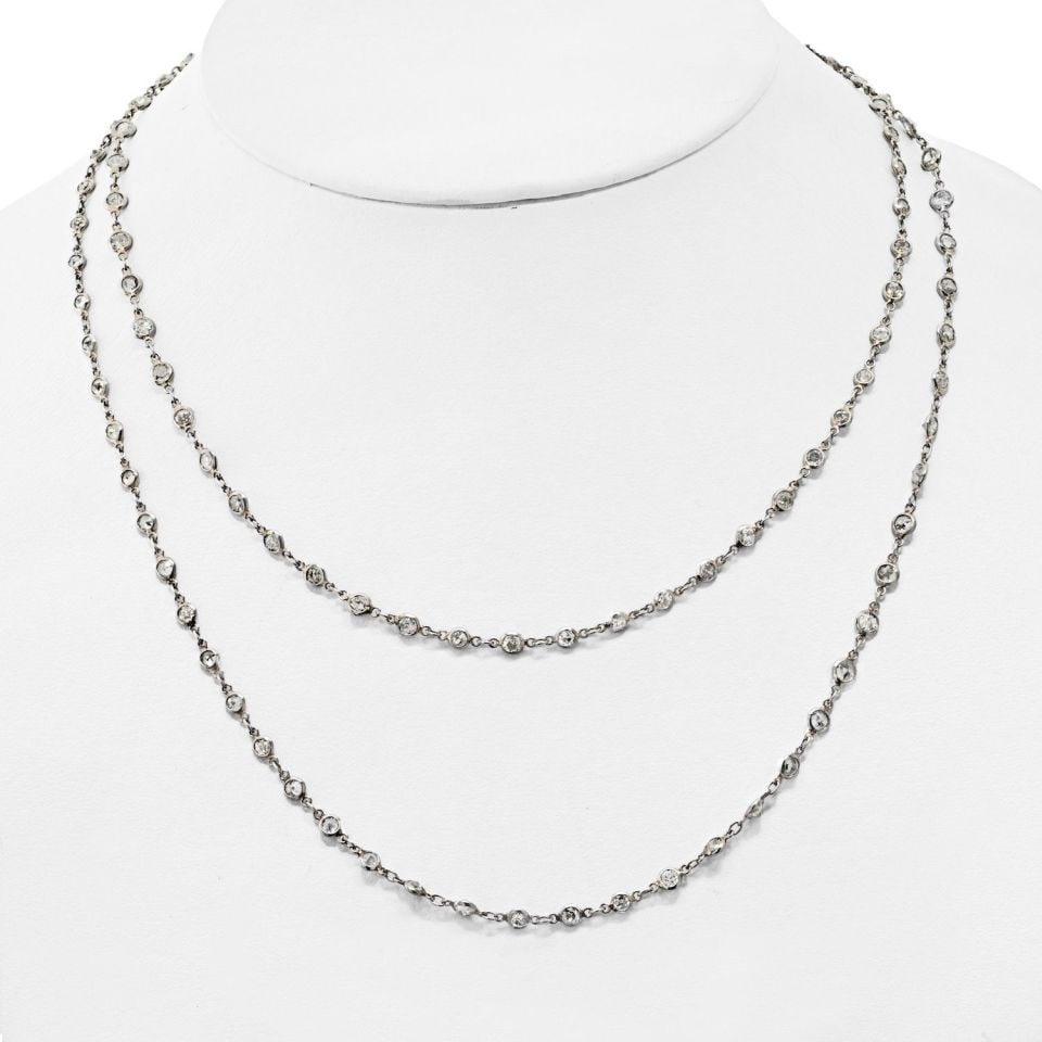 36 Inch Platinum Necklace with 18.7 Carats Diamonds by the Yard: 36 Inch Platinum Necklace with 18.7 Carats Diamonds by the Yard Experience the elegance of this Platinum Diamond By The Yard Chain Necklace, measuring 36 inches in length. Crafted from high-quality pl