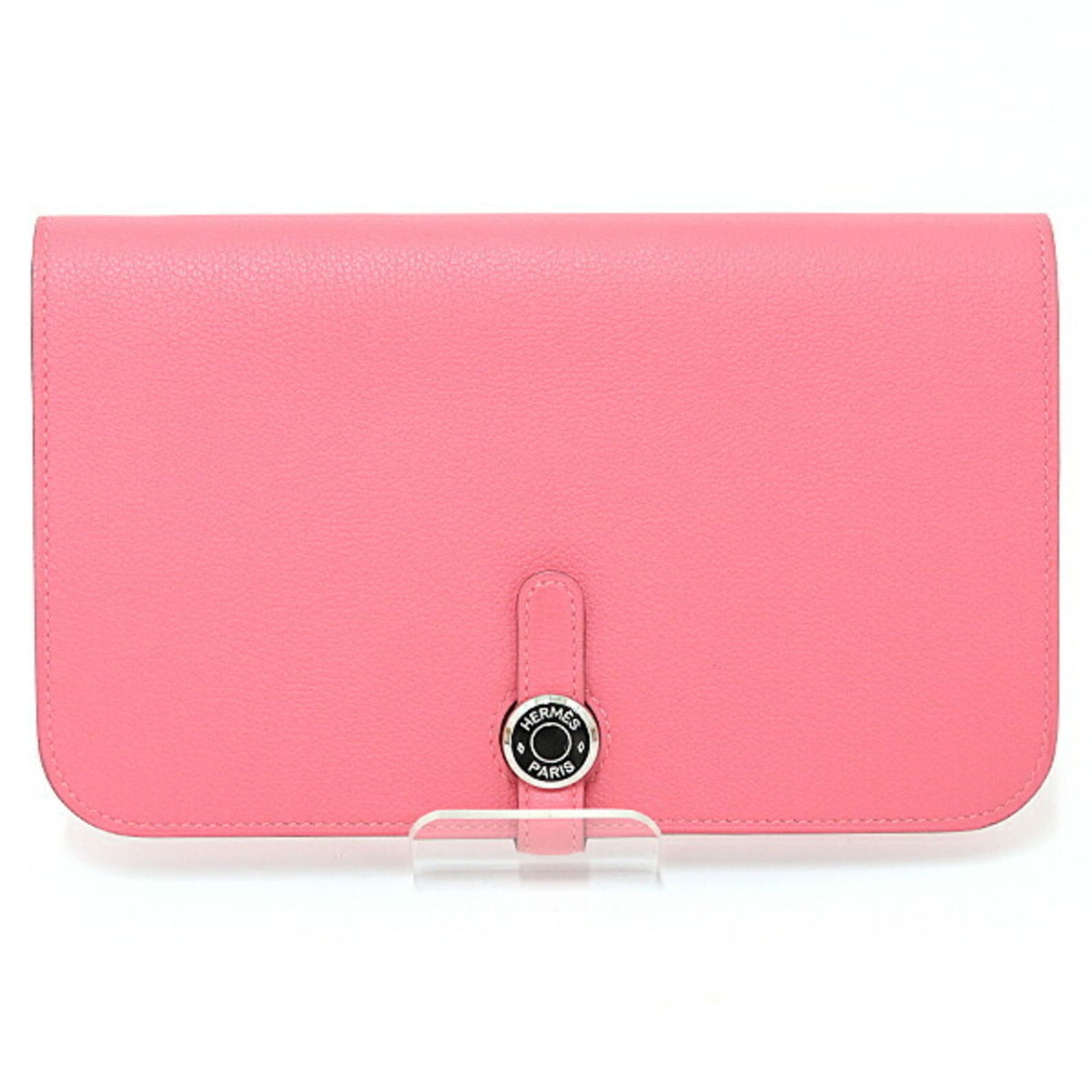 Hermes Dogon Pink Leather Wallet France: Hermes Dogon Pink Leather Wallet France The Hermes Dogon is a women's leather wallet in pink, crafted in France. It features an elegant design with a spacious interior and subtle metal accents. The wa