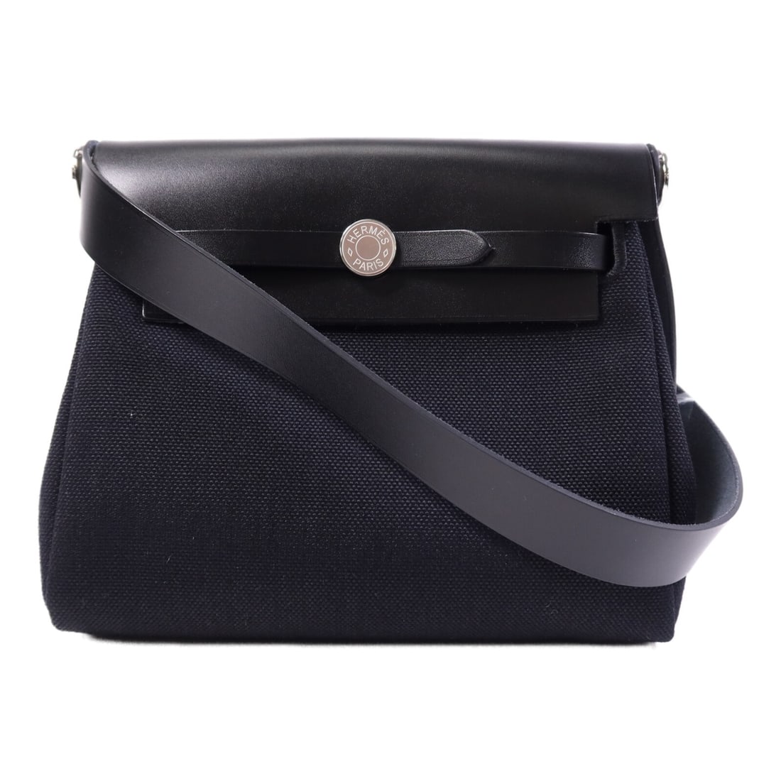 Hermes Mini Herbag Black Canvas Shoulder Bag with Palladium Hardware: Hermes Mini Herbag Black Canvas Shoulder Bag with Palladium Hardware This Hermes Mini Herbag shoulder bag features a black canvas exterior and is designed for versatile, everyday use. The bag is craft