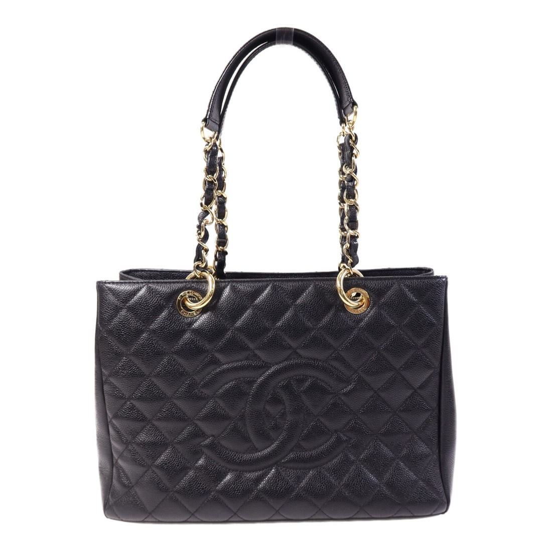 Black Calfskin Grand Shopping Tote by CHANEL with CC and Gold Hardware: Black Calfskin Grand Shopping Tote by CHANEL with CC and Gold Hardware This CHANEL Grand Shopping Tote (GST) is crafted from luxurious black calfskin leather and features the signature CC logo. The ba