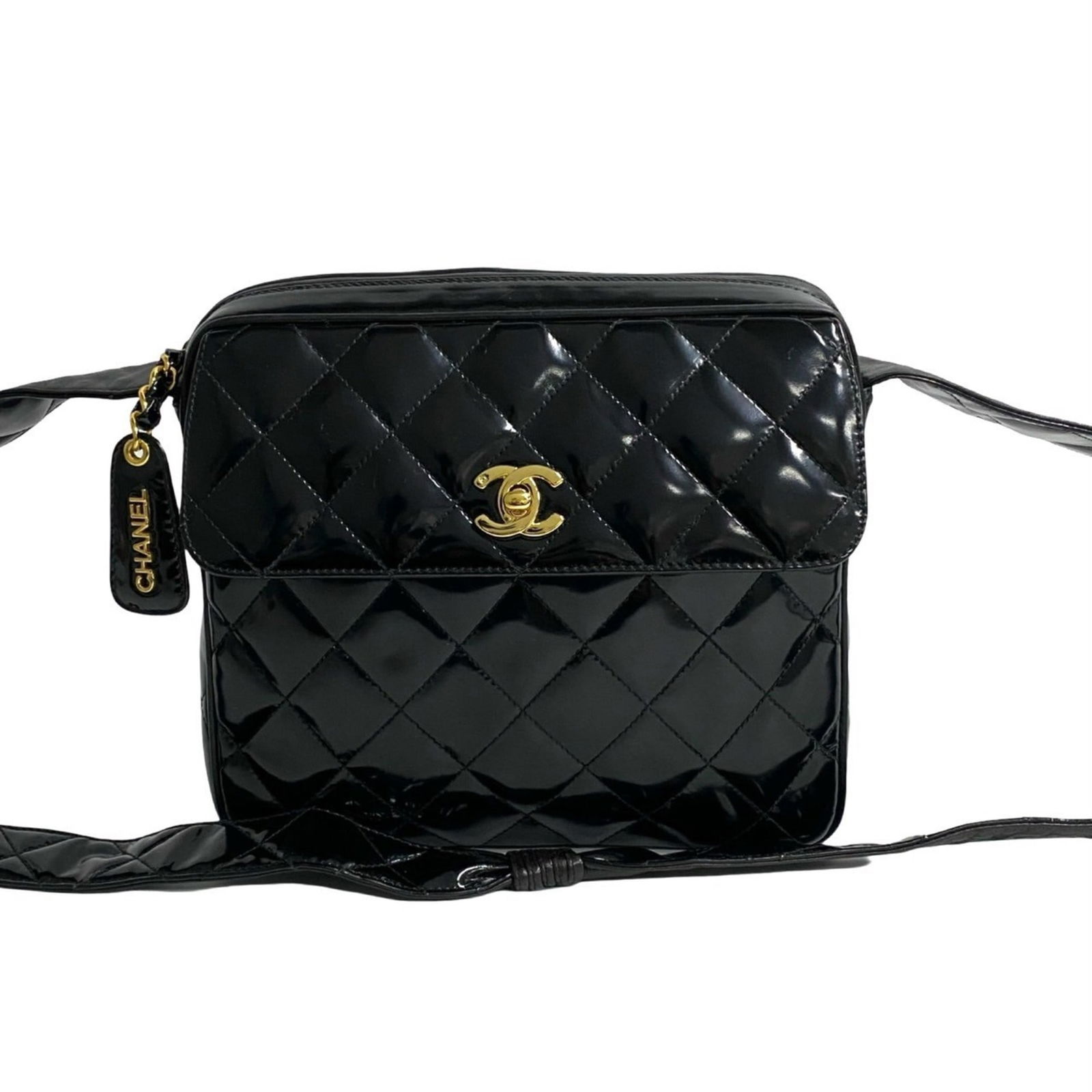 Chanel Black Patent Leather Camera Bag 20cm x 22cm x 6cm: Chanel Black Patent Leather Camera Bag 20cm x 22cm x 6cm This Chanel Camera bag features a classic black patent leather exterior and is designed for women. Made in Italy, it is crafted with attention