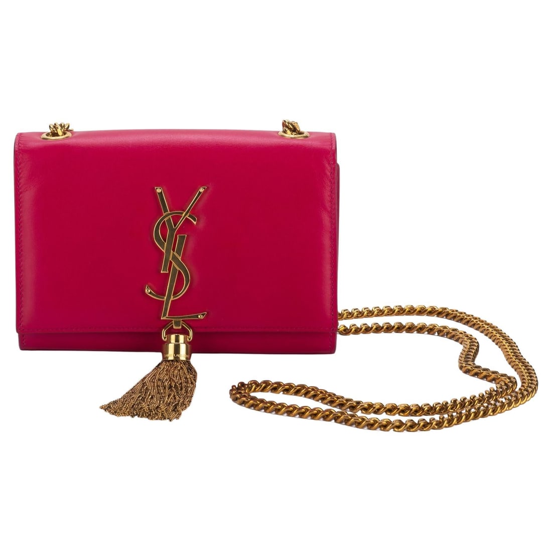 Yves Saint Laurent Fuchsia Leather Crossbody Bag with Gold Tassel: Yves Saint Laurent Fuchsia Leather Crossbody Bag with Gold Tassel This exquisite Yves Saint Laurent cross body bag showcases a vibrant fuchsia leather exterior paired with a stylish gold tassel and ch