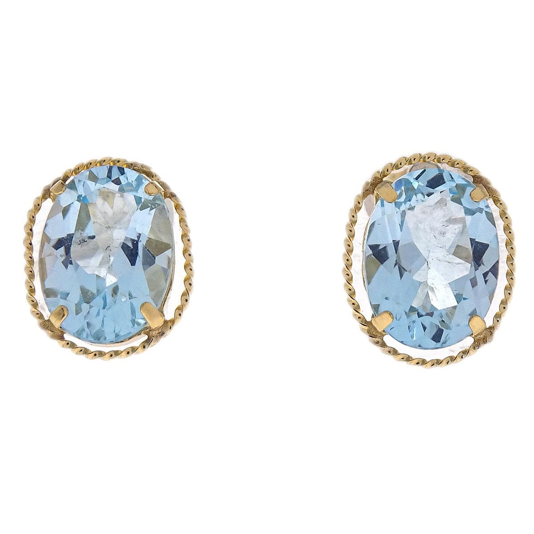 18K Gold Earrings with Blue Topaz Gemstones: 18K Gold Earrings with Blue Topaz Gemstones These pierced earrings are crafted from 18K gold and feature blue topaz as the main stone. They are designed in a piercing style and are in very good condit