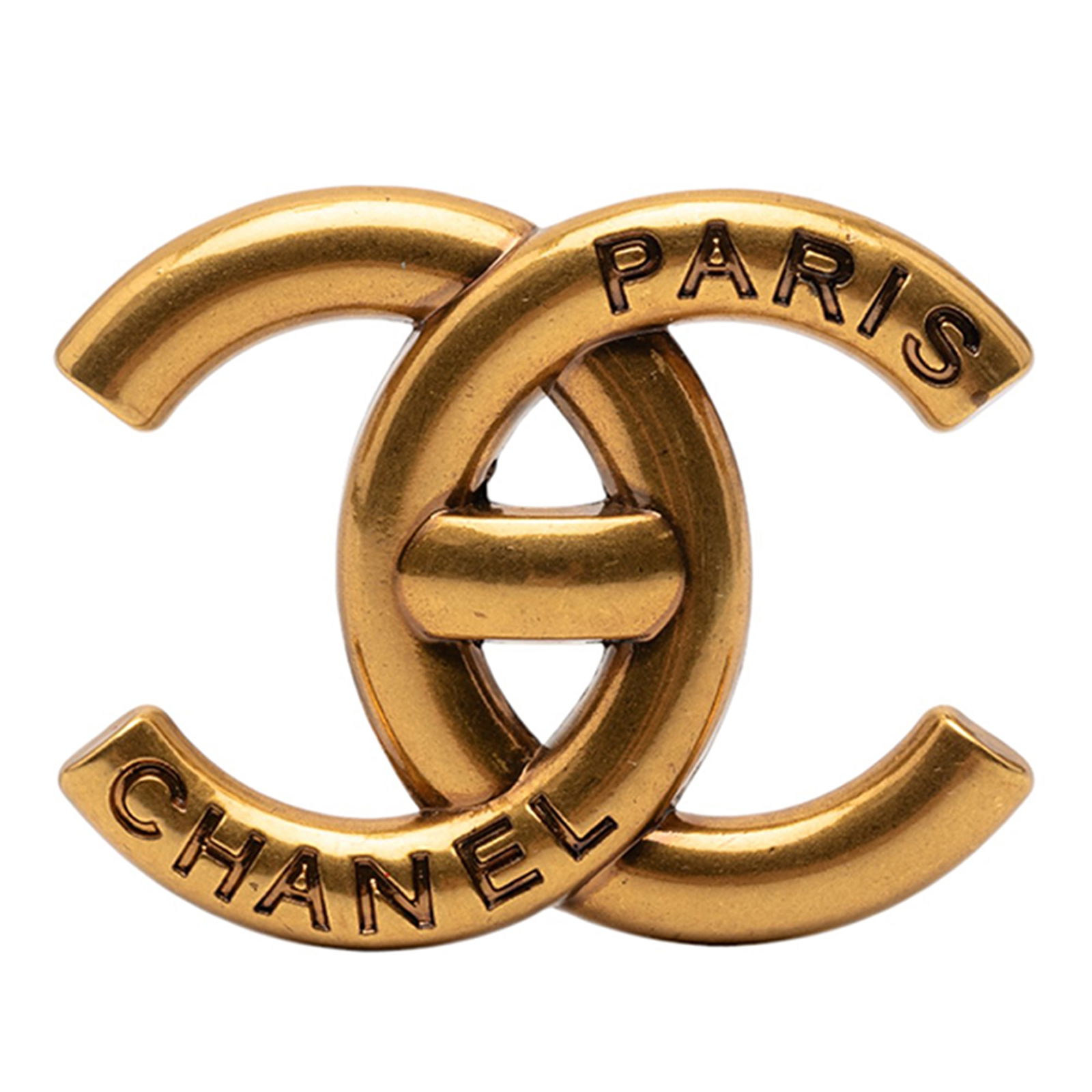 Chanel Gold Tone Metal CC Logo Pin Brooch: Chanel Gold Tone Metal CC Logo Pin Brooch This Chanel brooch showcases the iconic CC logo in a gold-tone metal finish, featuring a secure back pin closure. Crafted in Italy, it is a sophisticated cost