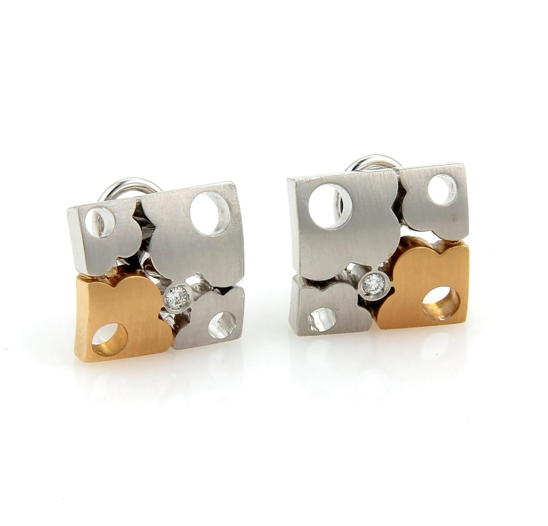 Koesia 18k Gold Floral Huggie Earrings with Diamond: Koesia 18k Gold Floral Huggie Earrings with Diamond Discover a stunning pair of authentic Koesia earrings, expertly crafted from solid 18k white and rose gold with a smooth satin finish. These unique